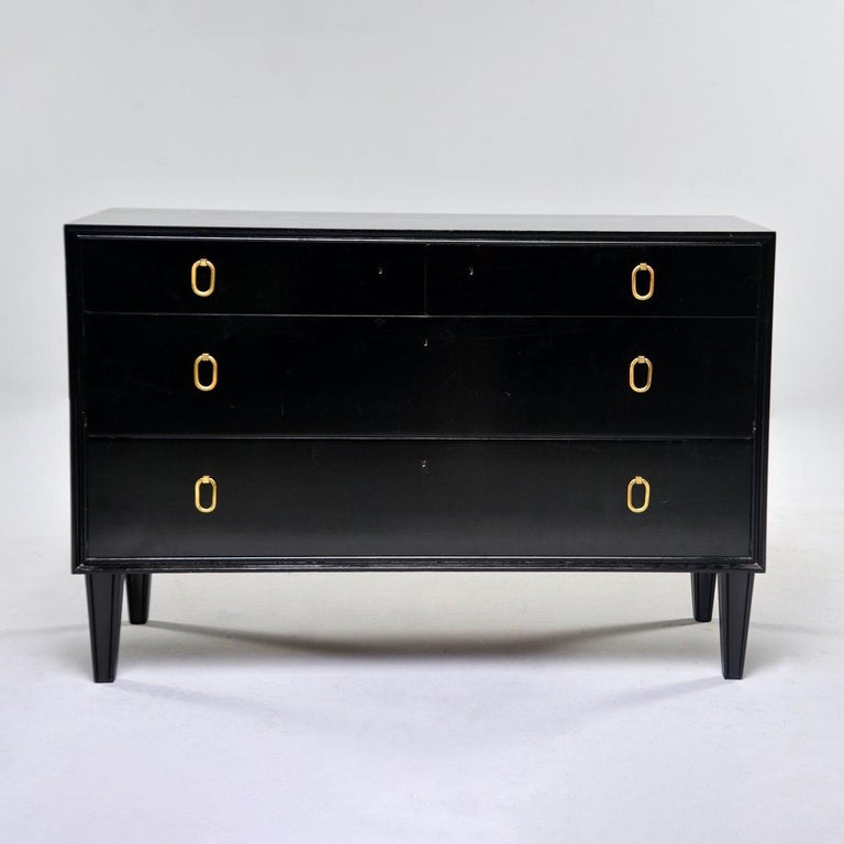 Four-drawer mahogany bachelor’s chest by Swedish maker AB Svenska Mobelfabrikerna Bodafors has a newly applied ebonized finish and the original brass hardware, circa 1960s. Drawers have dovetail construction. Very good overall vintage