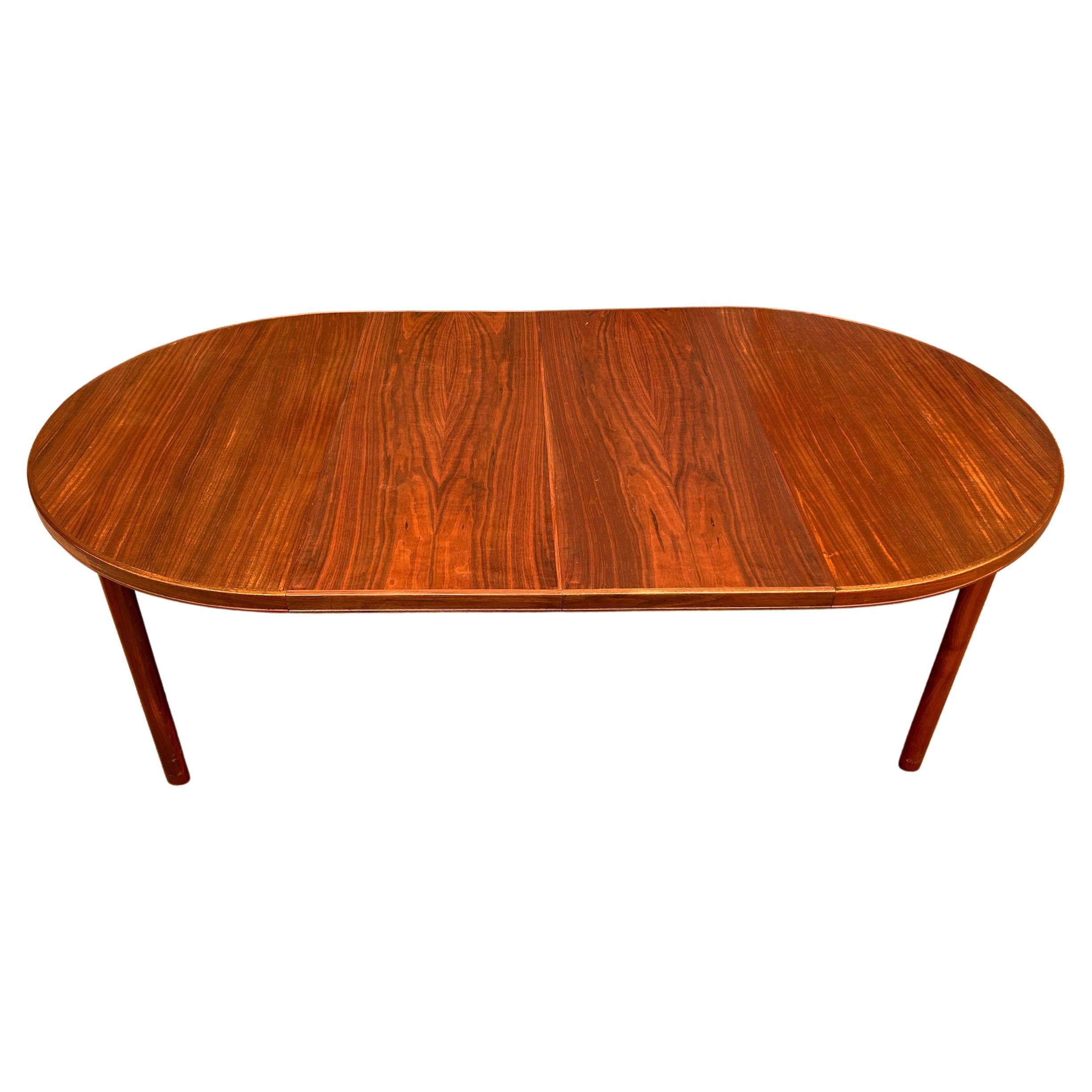 Midcentury Swedish Modern Round Teak Dining Table by DUX with 2 Leaves For Sale