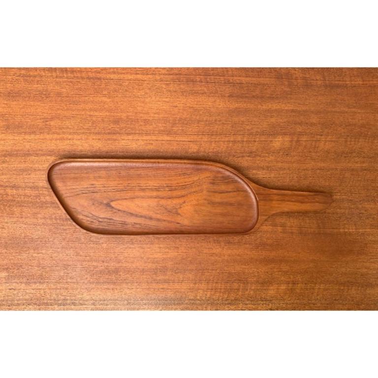 Ciotola in legno di teak svedese di metà secolo di Upsala Slöjd, anni '60, in ottime condizioni. Progettato tra il 1960 e il 1969 Questo pezzo ha un marchio di attribuzione.

Informazioni aggiuntive:
Materiali: Teak
Stile: Medioevo Moderno
Paese di