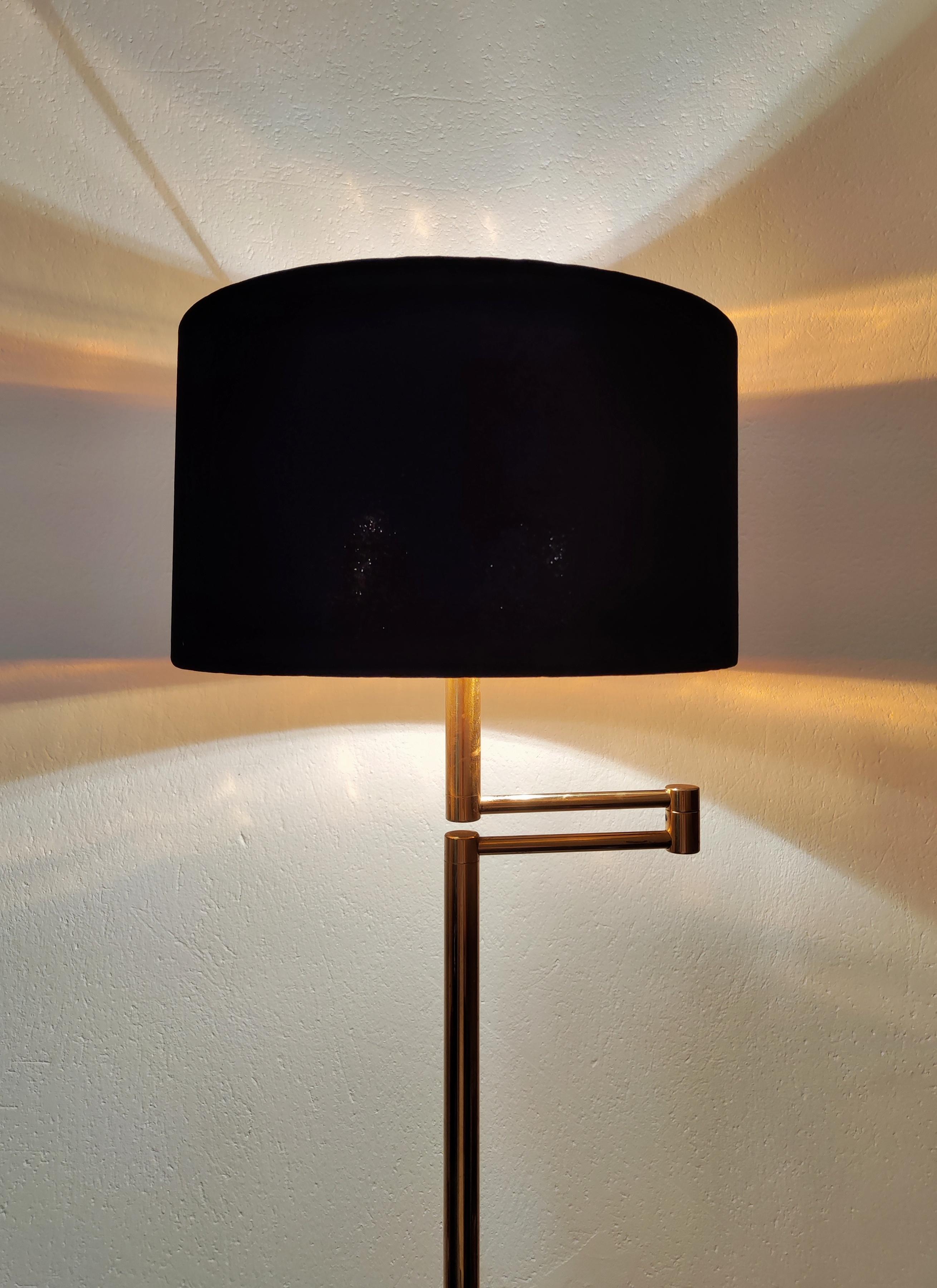 In this listing you will find a Mid Century Modern Swing Arm floor lamp done in brass with black velvet shade. Made in West Germany in 1960s.

The lamp is in a very good vintage condition with some patina on brass. The velvet shade is new.

When