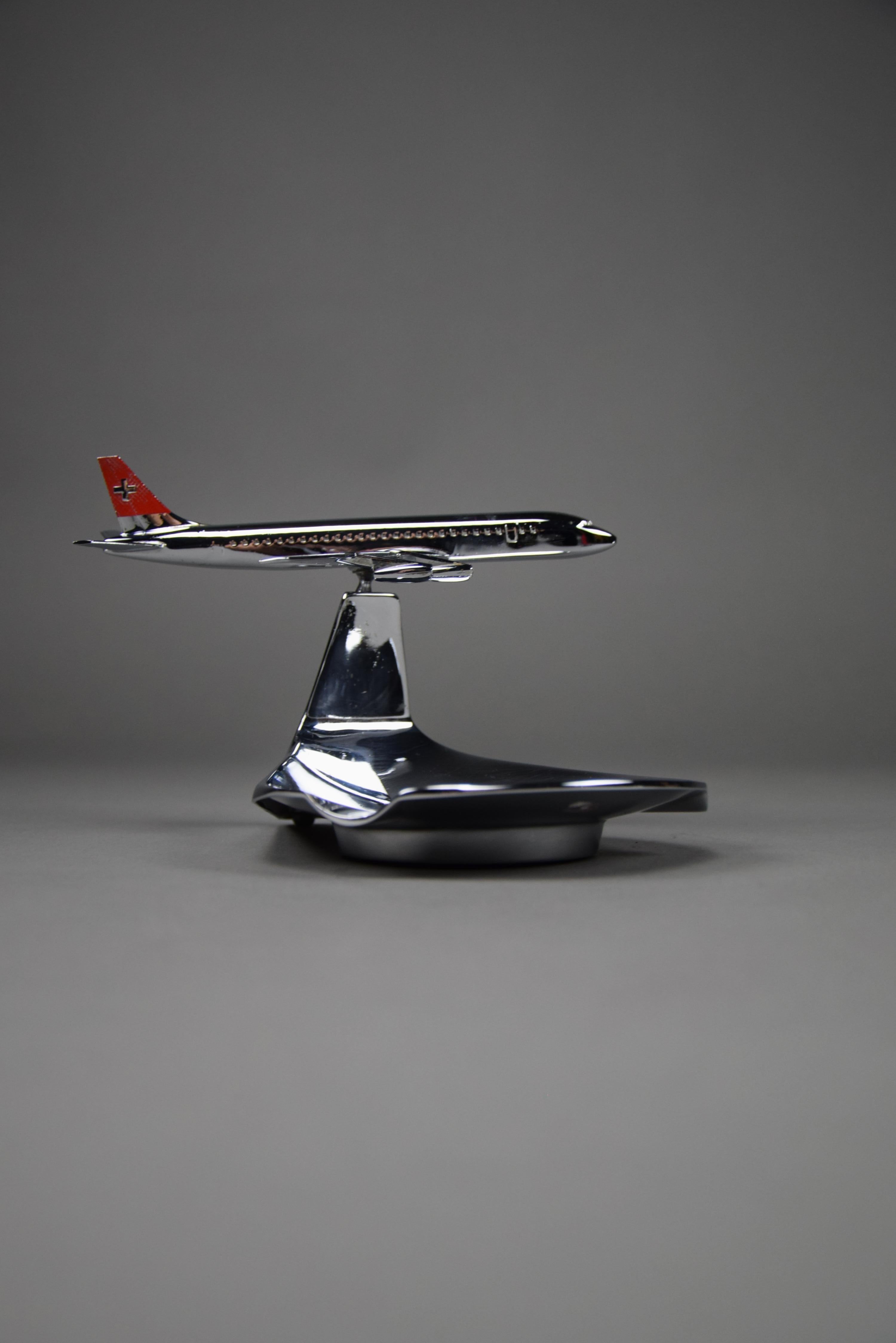 Introducing a Collector's Dream: Rare 1960s Swiss Air Chrome-Plated Ashtray with a DC8 Airplane Model!

Are you ready to own a piece of aviation history that's not just functional but also a striking work of art? Feast your eyes on the rare 1960s