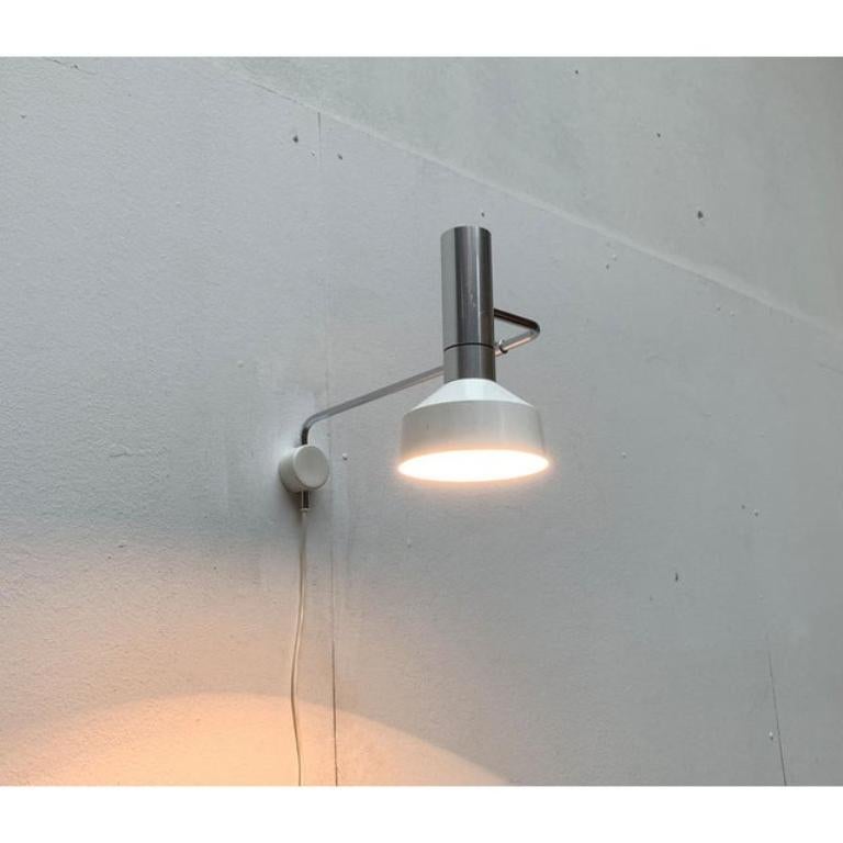 Lámpara de pared minimalista suiza de mediados de siglo Minilux para Baltensweiler, años 60 en Excelente estado para la venta en Hamburg, DE