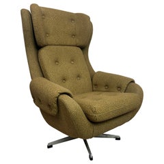Mid-century swivel chair by Gerald Neusser