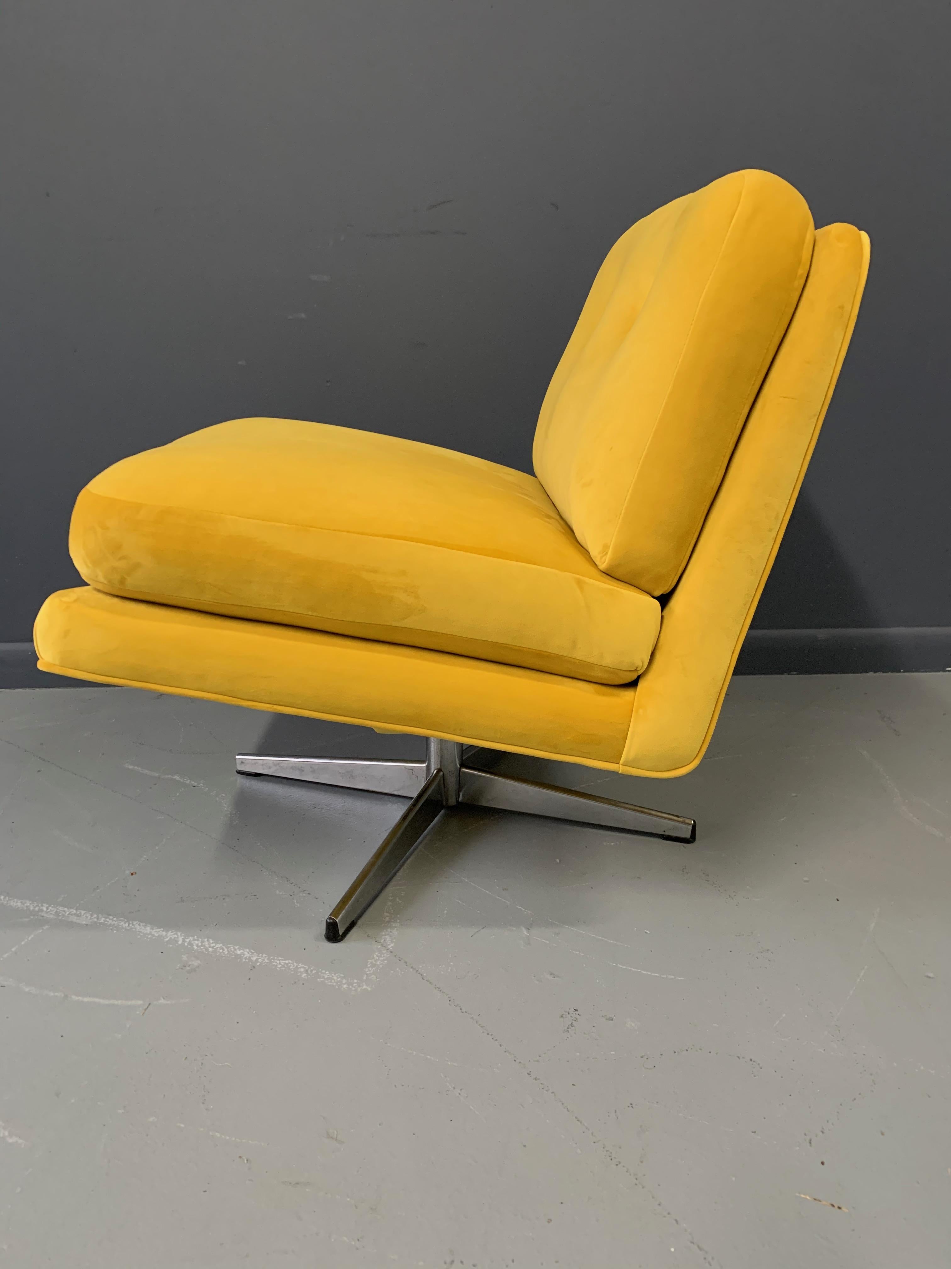 Great accent chair upholstered in a stunning marigold velvet with a chrome base.