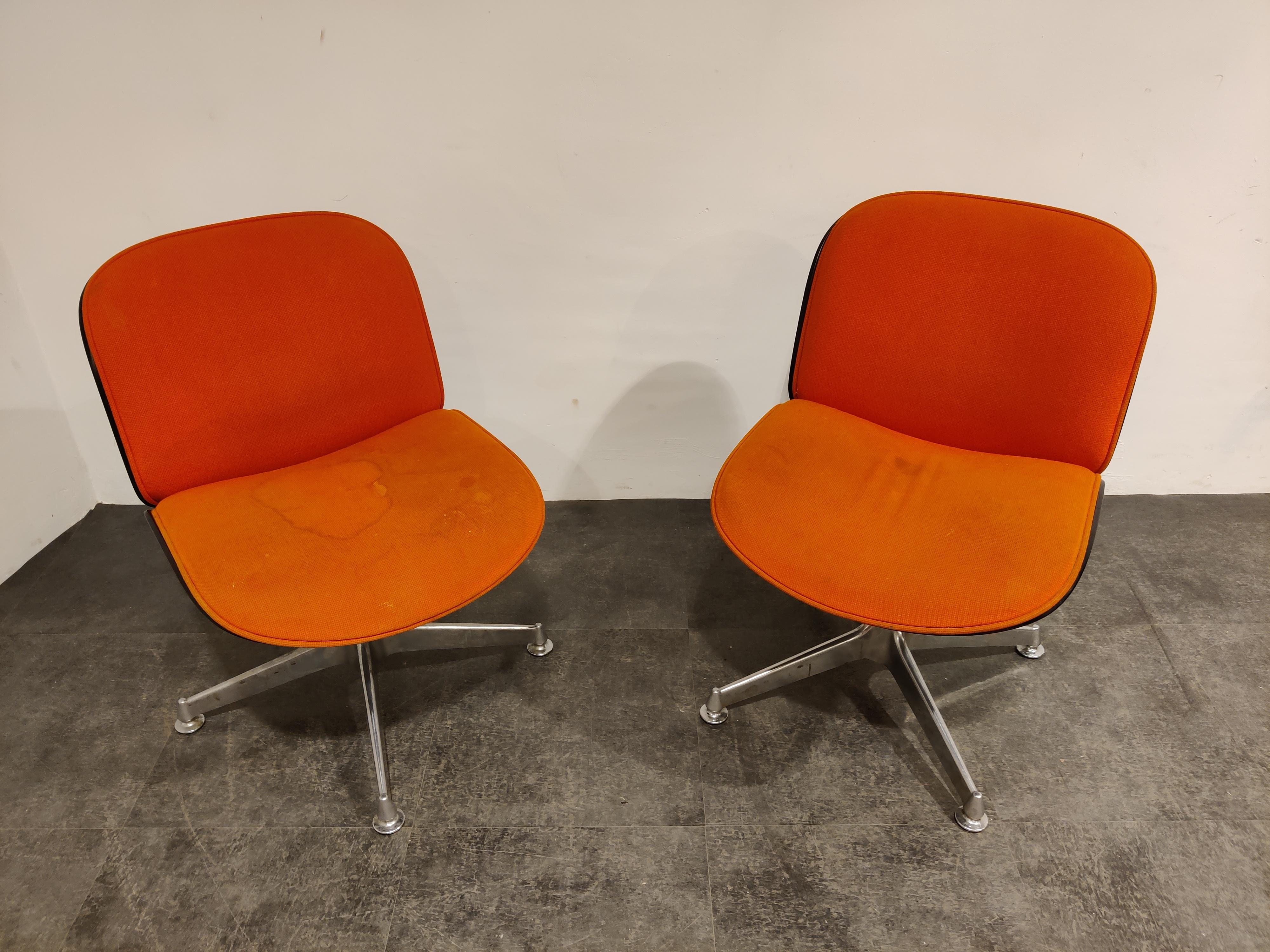 Mid century rosewood swivel/desk chairs by Ico Parisi for MIM Roma. (Mobili Italiani Moderni)

They come in their original orange fabric which is stained, we can have them reupholstered for you (inquire for more information)

Frames and base is