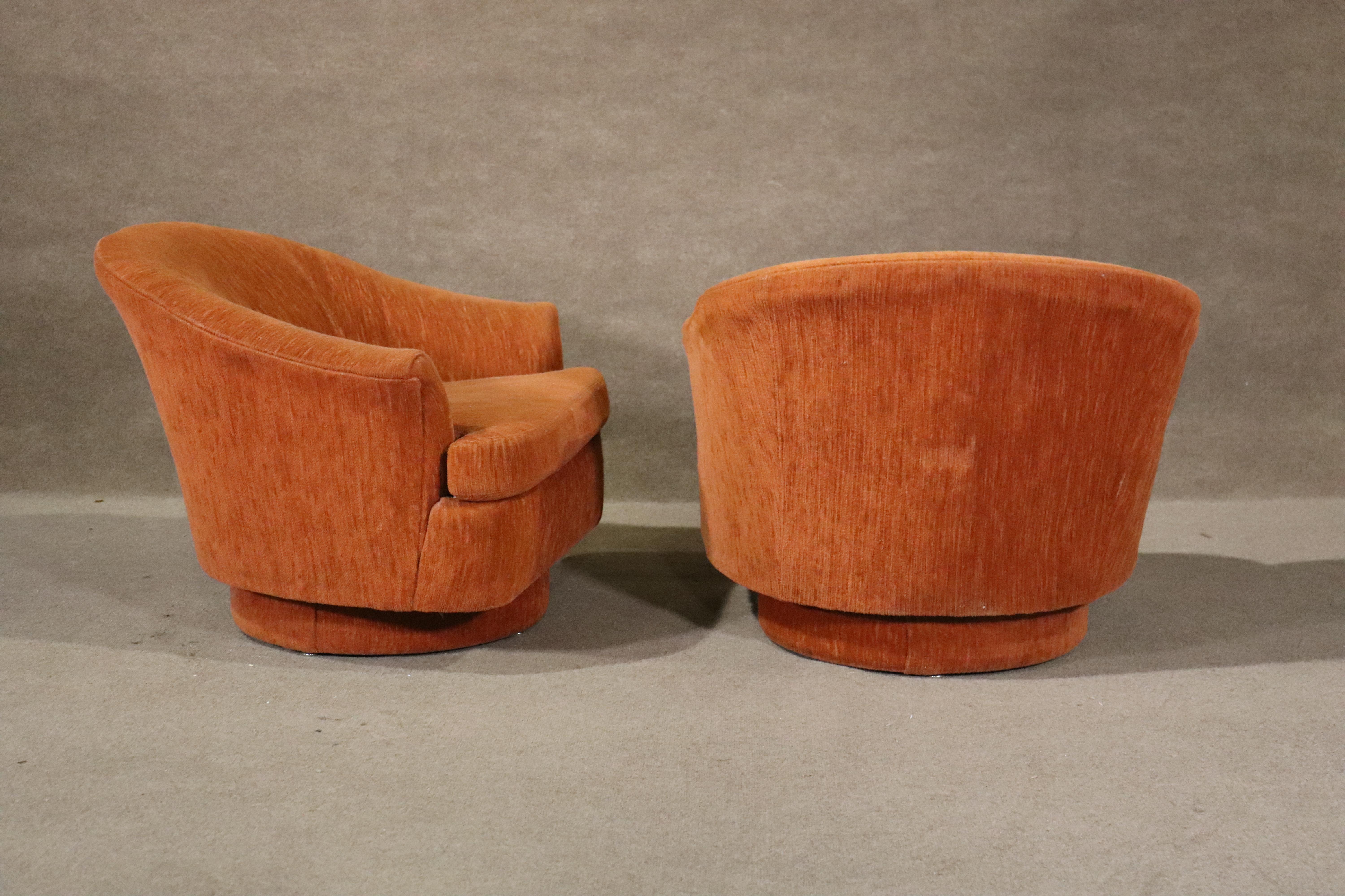 Mid-century modern swivel barrel back chairs. Terrific round shape design with flared arms.
Please confirm location NY or NJ