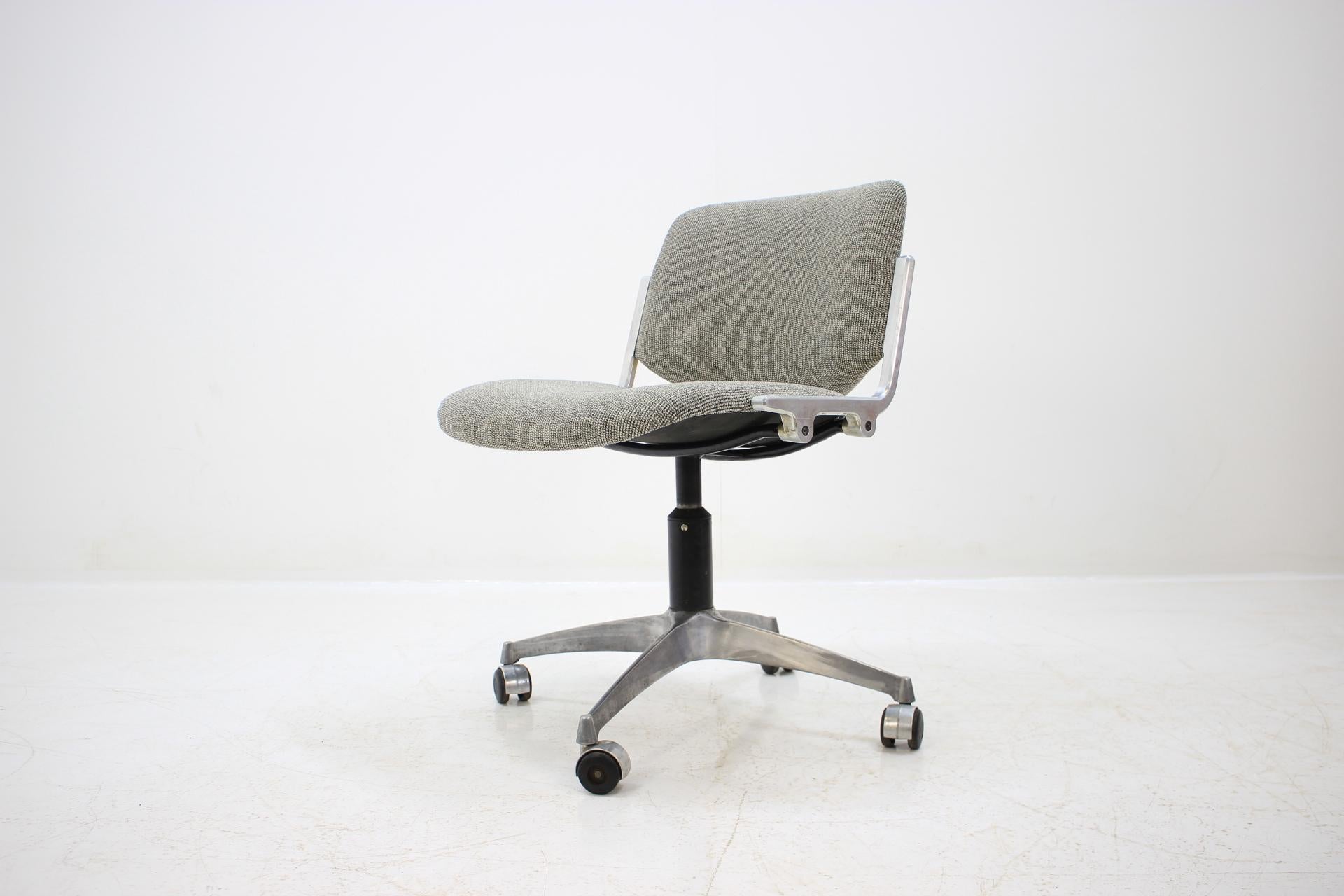 - Swivel design chair.
- Marked.