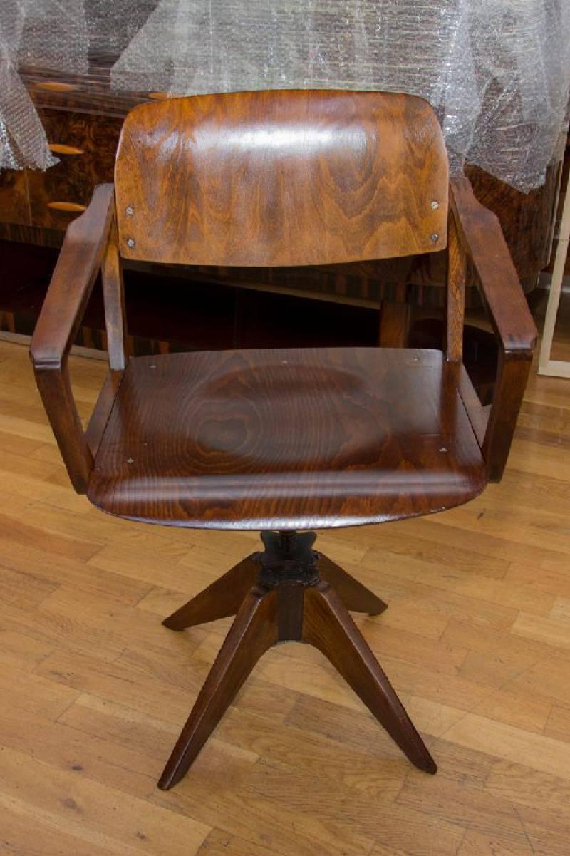 Writing desk chair made of beechwood. The chair were produced by Ton and made in the 1960s in Czechoslovakia. It´s a part of the writing desk which is also available. The chair is in excellent condition after complete renovation and is adjustable