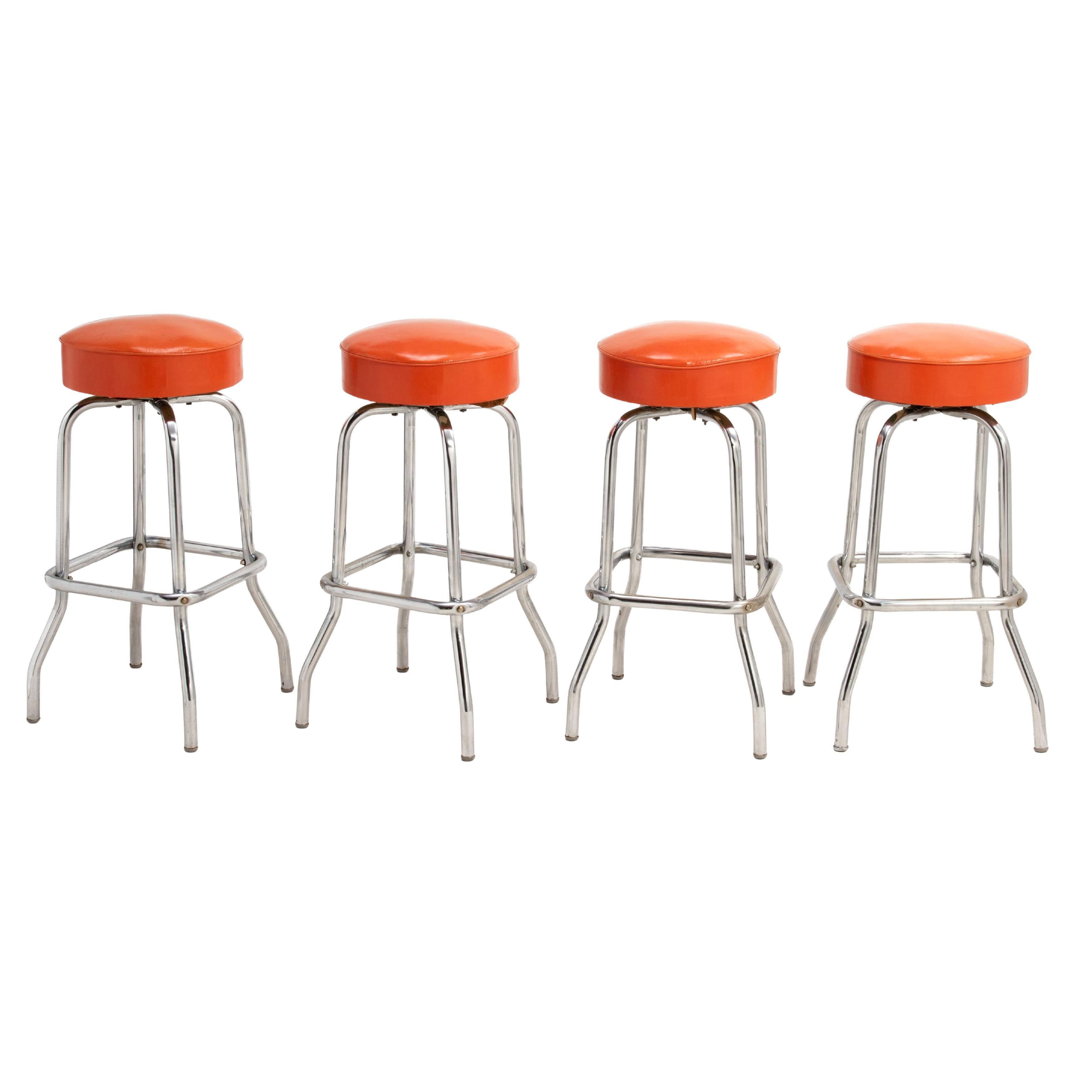Mid Century Swiveling Seat Barstools Original Chrome Orange Vinyl A Set of Four For Sale