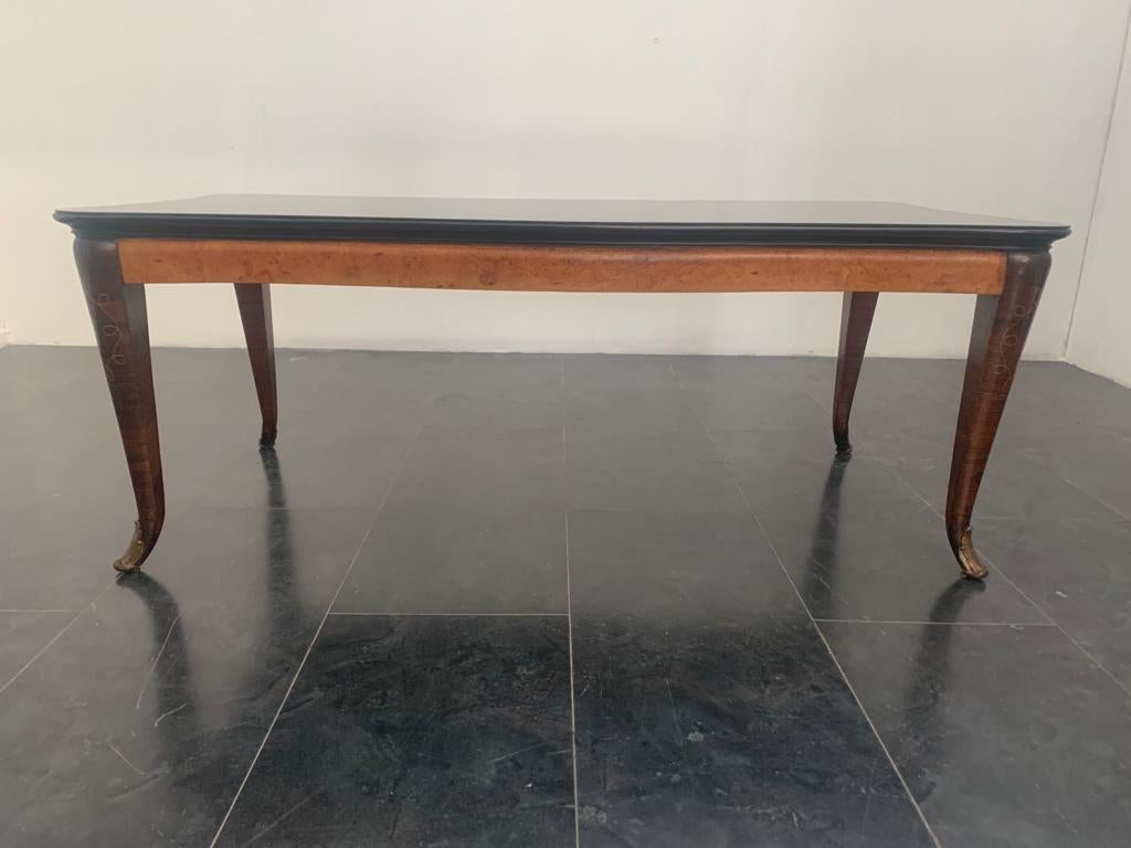 Table with inlaid rosewood legs, elm briar sides and ebonized under top. Black glass top, bronze tips.
Packaging with bubble wrap and cardboard boxes is included. If the wooden packaging is needed (crates or boxes) for US and International