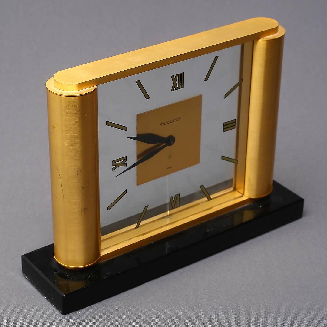 Brass and glass construction with eight days movement. Made by Jaeger-LeCoultre in Switzerland in the 1960s.