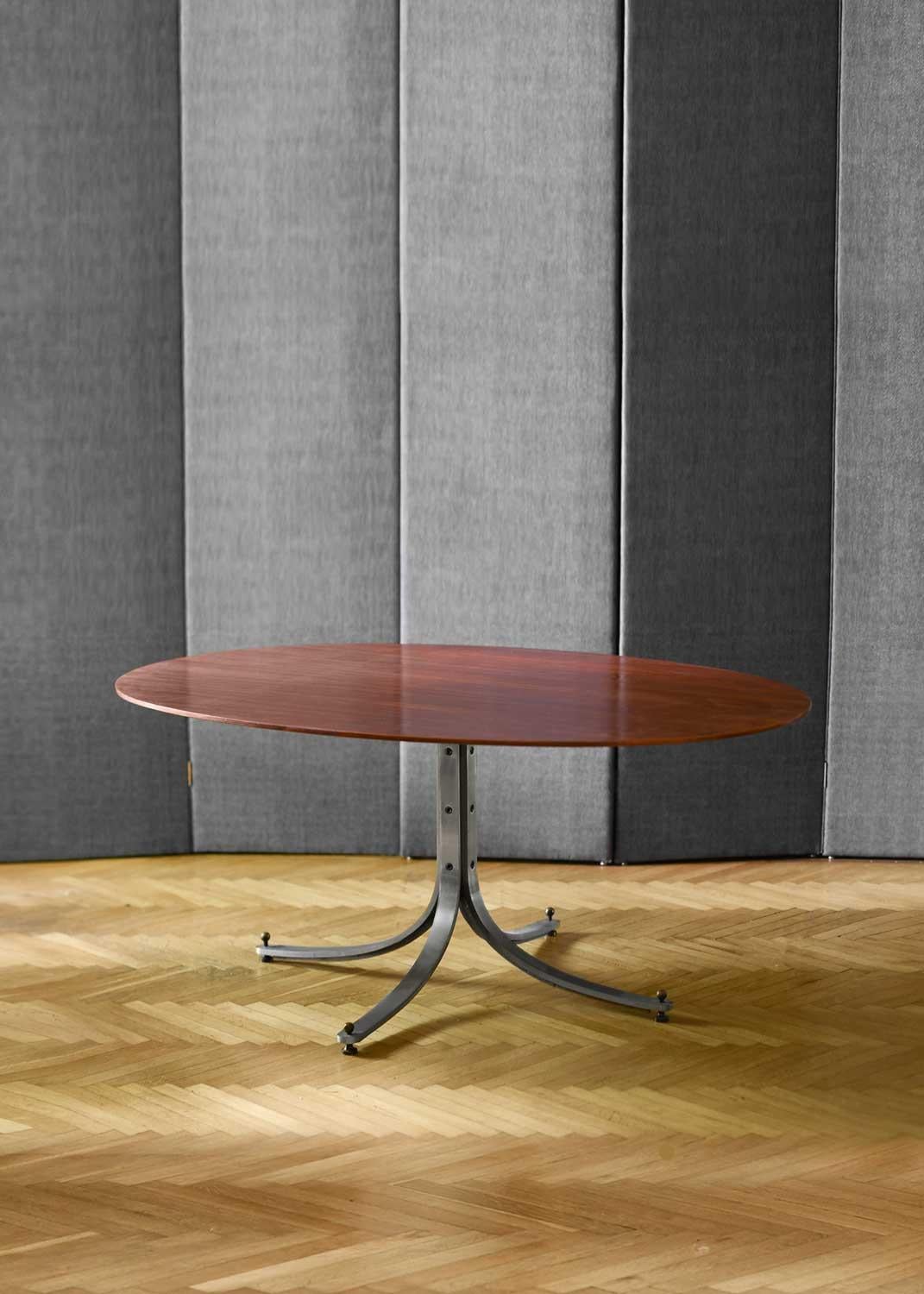 Midcentury table design Sergio Mazza for Arflex 1960 – with adjustable feet
Product details
Made of curved metal with wood top
Dimensions: 162w x 72h x 120d cm
Materials: wood, metal
Designer: Sergio Mazza for Arflex 1960.