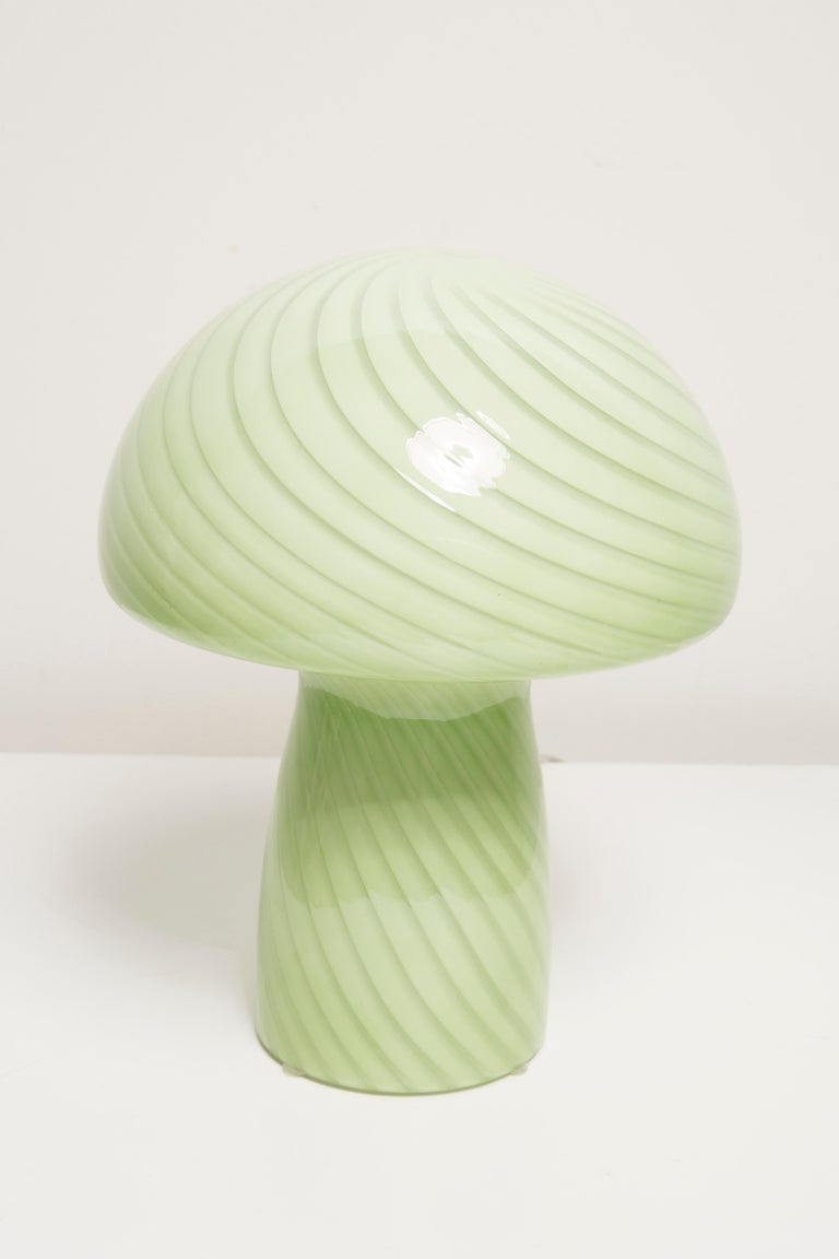Mid Century table lamp designed in France during the 1960s. 
White and green glass. Very good original vintage condition. 
Standard bulb. Only one unique piece.