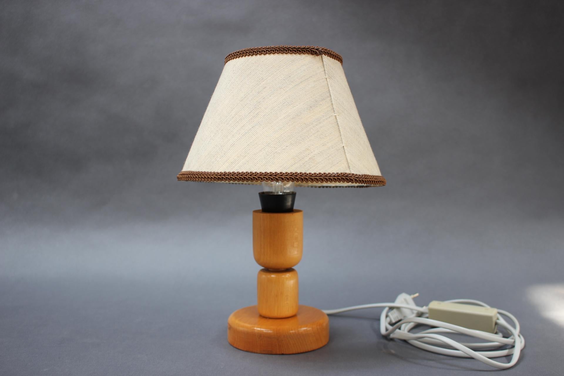 - Mid-century Table Lamp by Lipta, 1960s, Czechoslovakia,
- made of wood and lampshade by fabric
- shows signs of wear and age (scratches, etc.),
- in good original condition
