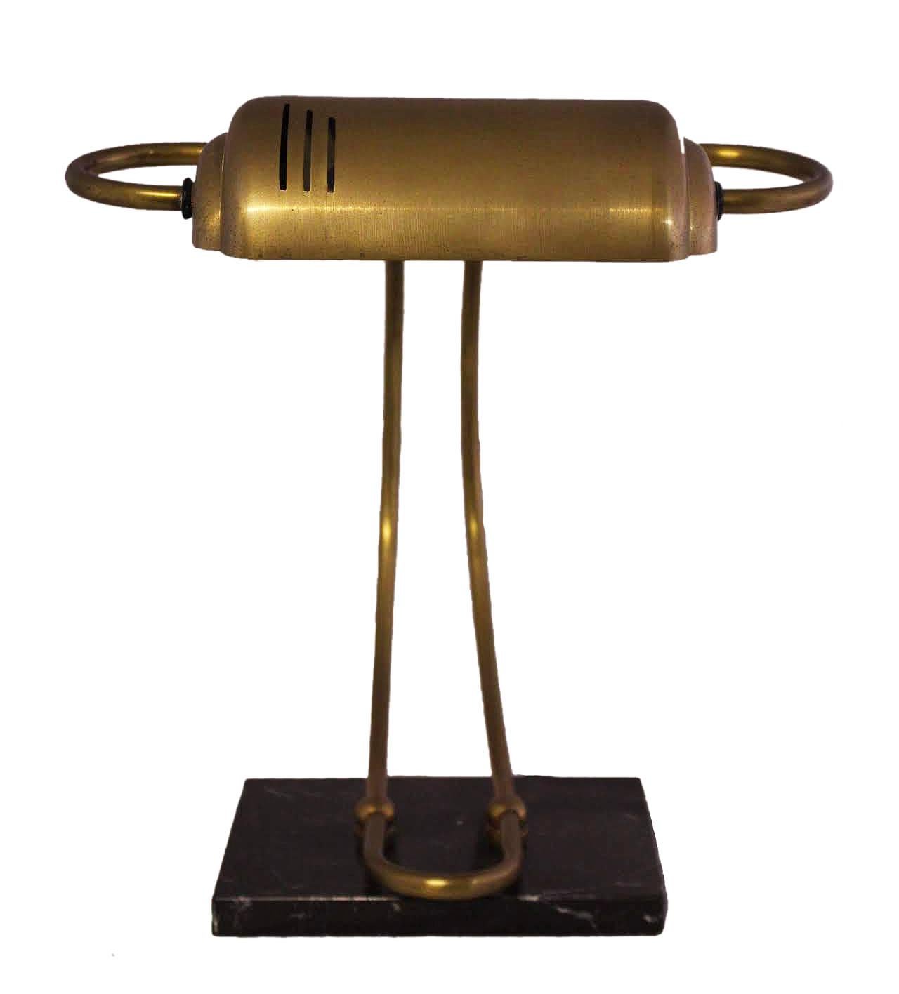 Desk light table lamp midcentury
Good quality gilt bronze brass
Black marble with variegated white veins
Very good vintage condition. Wear consistent with age and use
This can be rewired to USA or EU and UK standards.