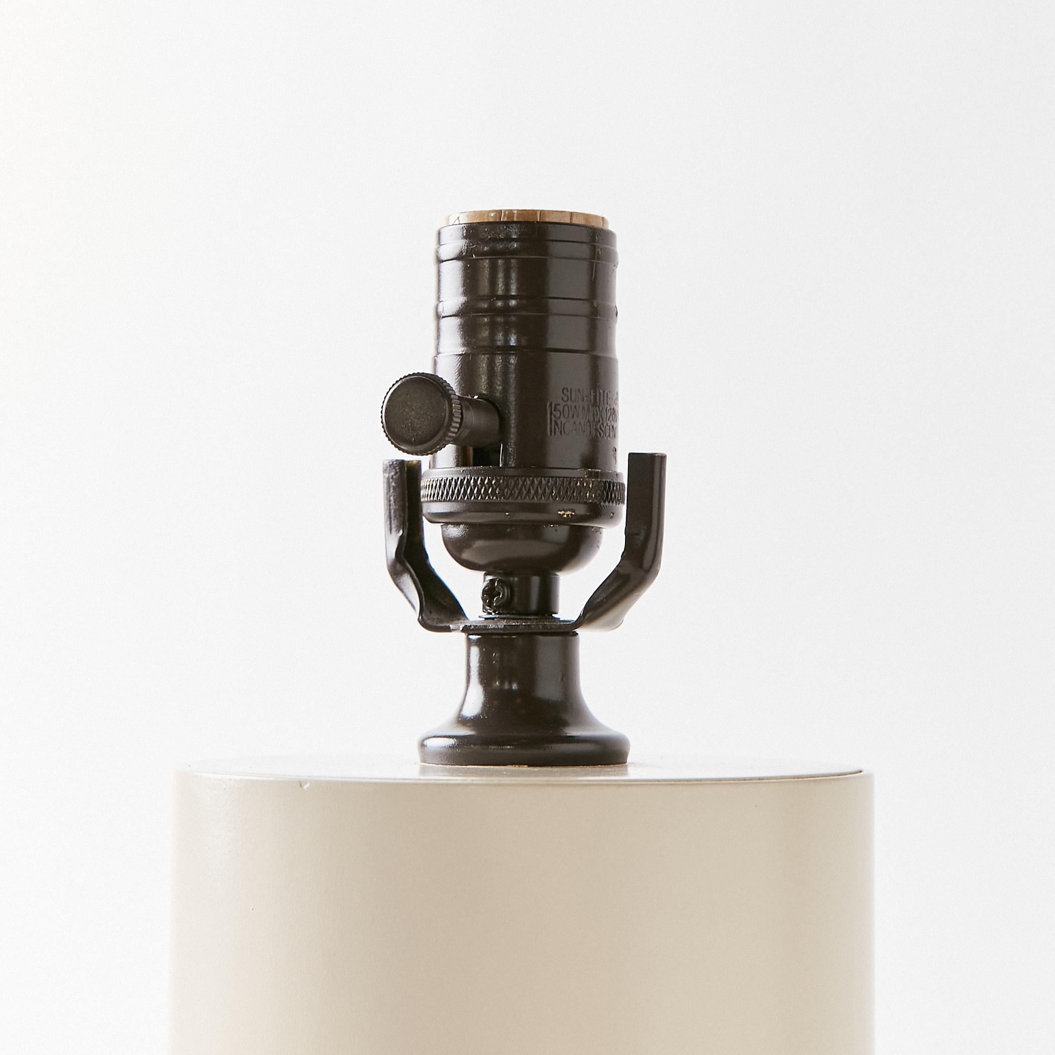 Mid-Century Table Lamp Finished in Off White with Antique Bronze Accents In Good Condition In Philadelphia, PA