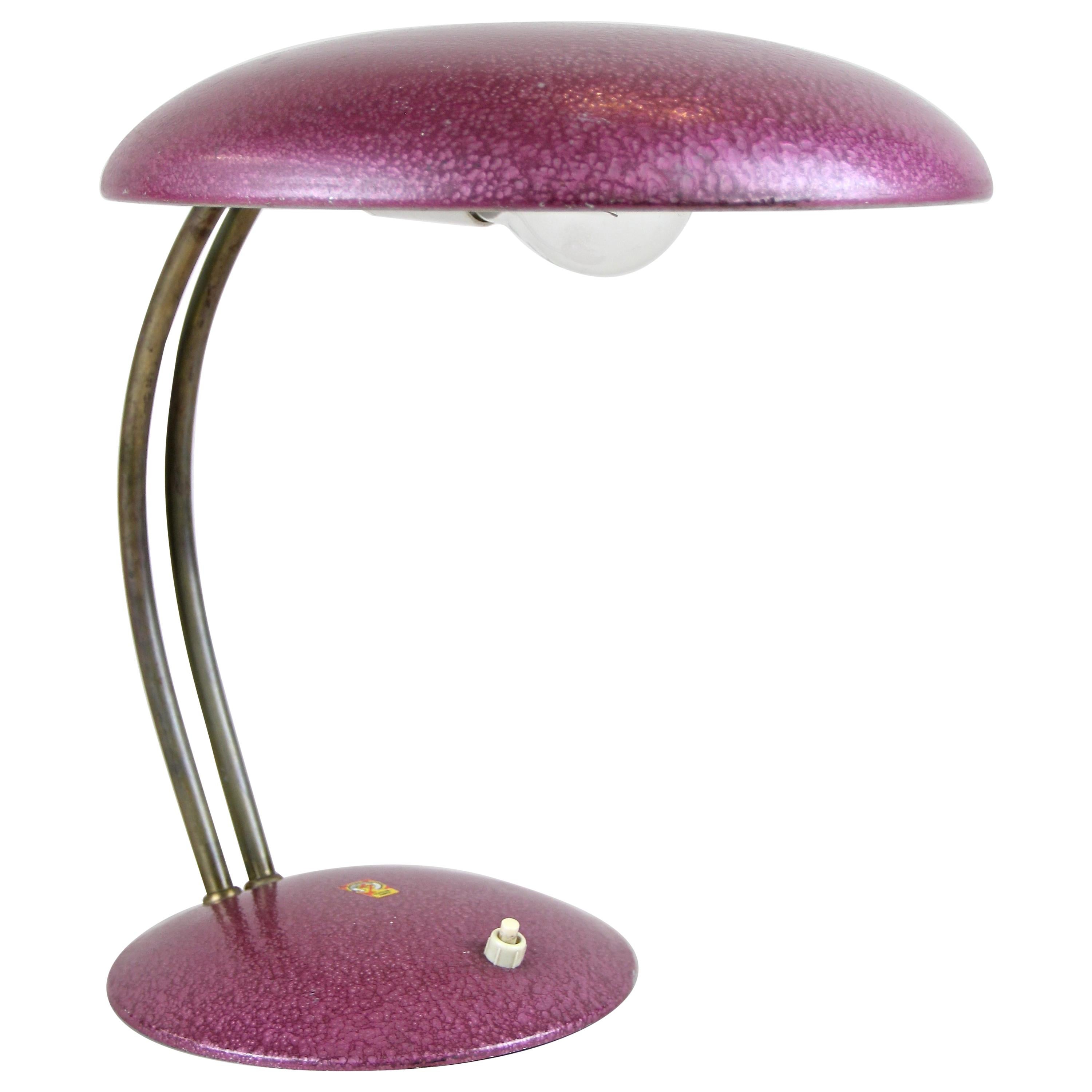 Fantastic mid century table lamp out of the period in Austria around 1960/70. A small mid 20th century table lamp with a timeless design that could have been made by a contemporary artist from the 21th century. Finished with a fantastic looking