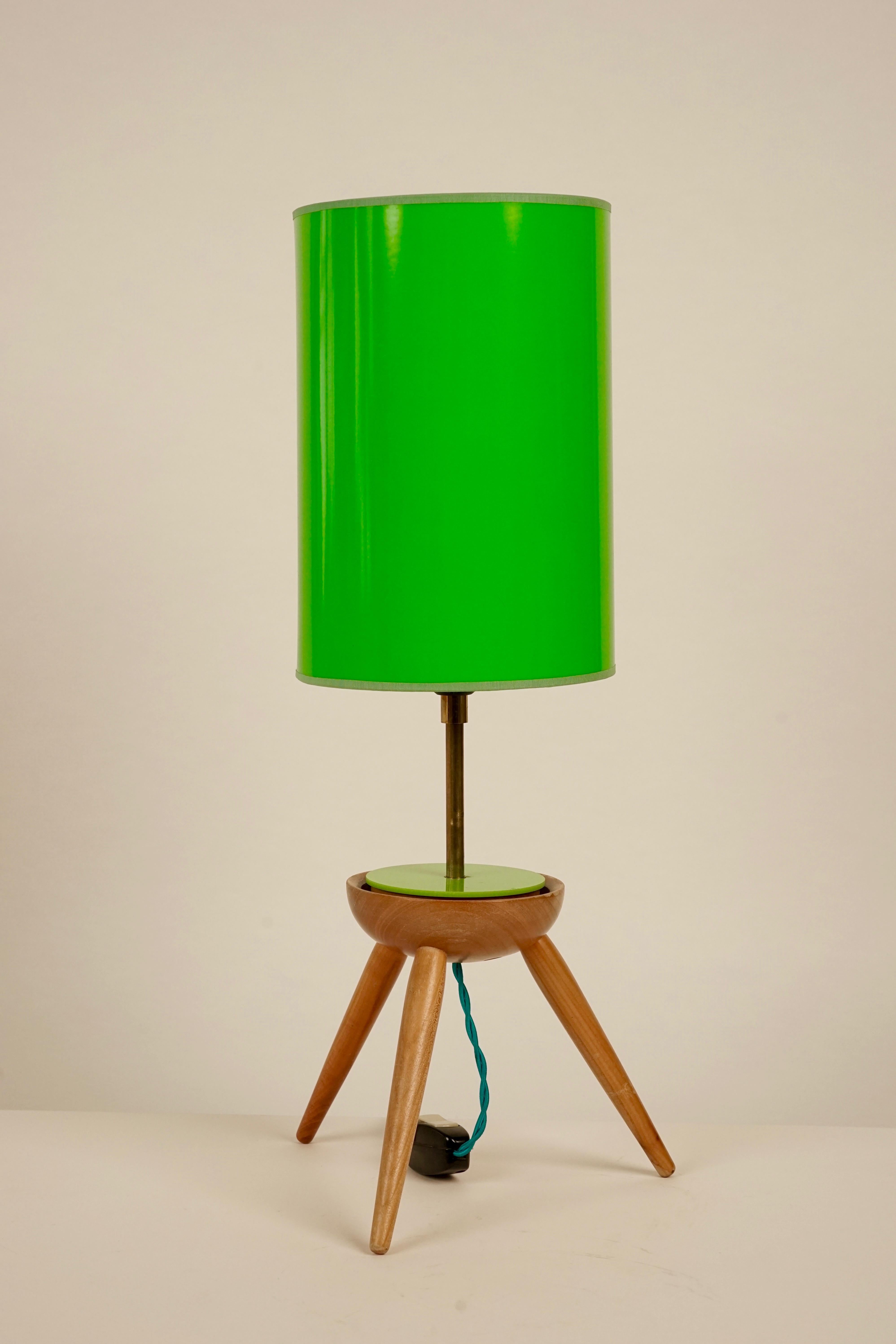 This beautiful midcentury table lamp from Czechoslovakia was designed for the company Krasna jizba and is composed of wood and plastic.
The shade is new, but matches the original. It comes with a twisted cloth cord.