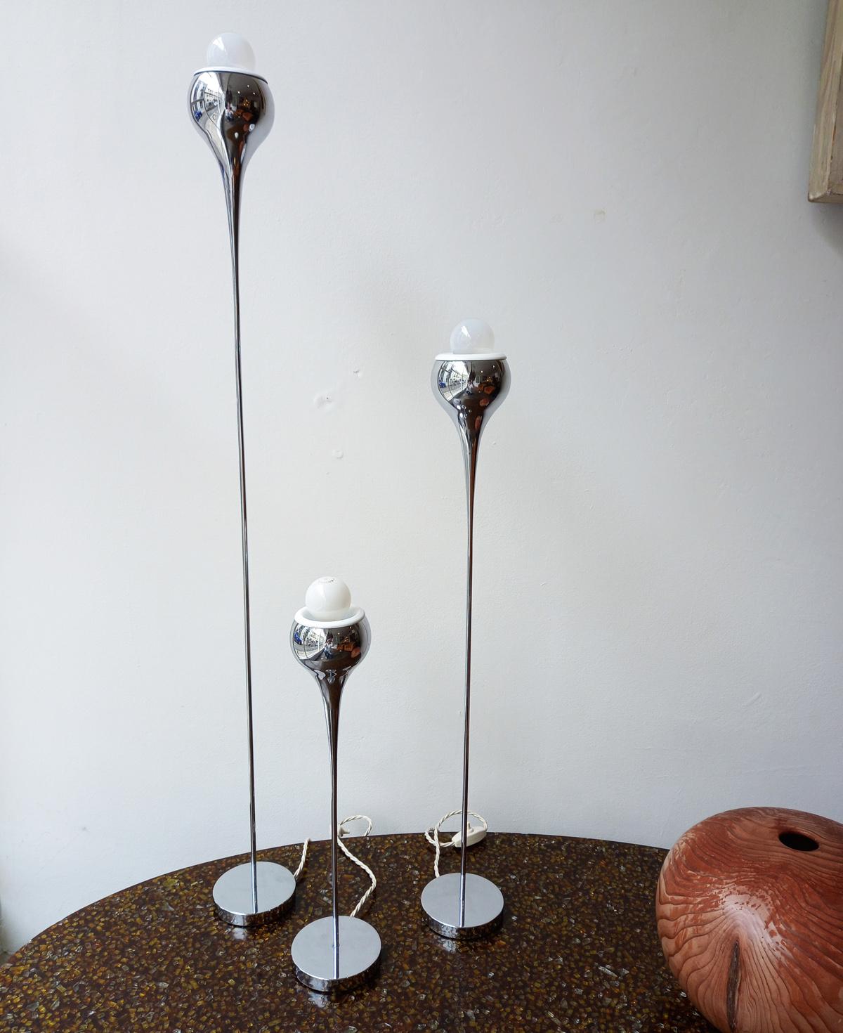 Att. Angelo Brotto, elegant set of chromed table lamps, or floor lamps, Italy circa 1970s made by Esperia, Poggibonsi. In a chromed finish and white enamel top ring. Newly rewired with beige fabric twisted cables and light switch, E17 bulbs.