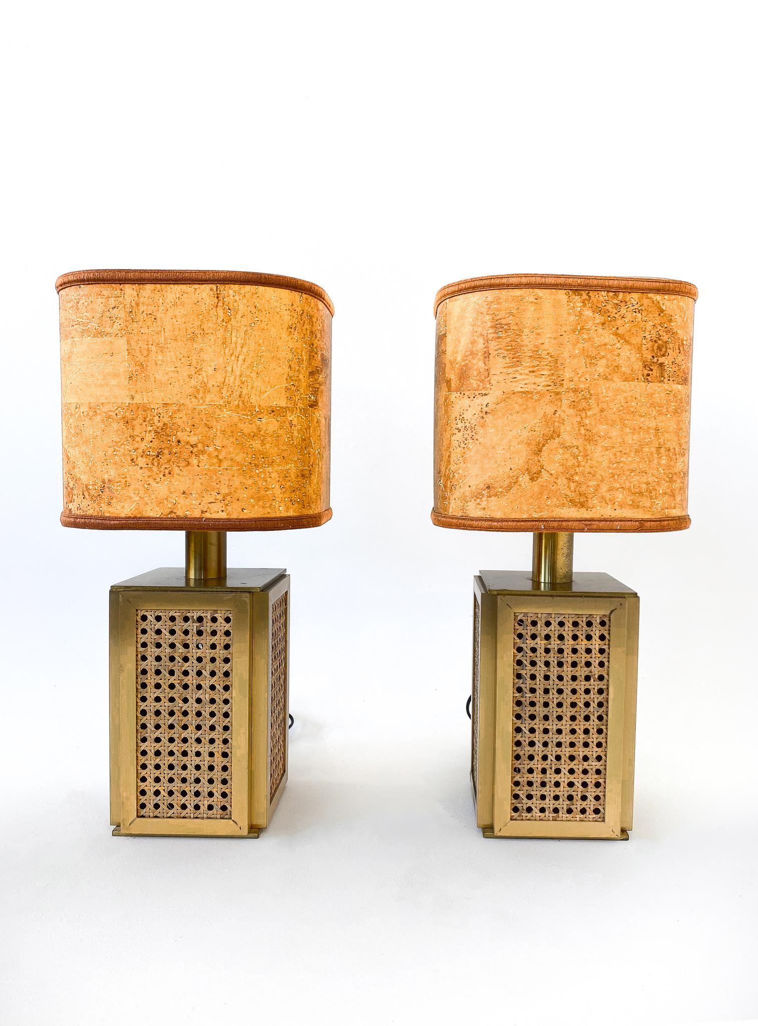 Mid century modern table lamps Corc shade, brass and cane base, Italy, 1970s.

A rare set of 2 large Italian Table lamps from the 70s in high qualitiy and in good vintage condition. The solid base of these lamps is made of brass and cane - also
