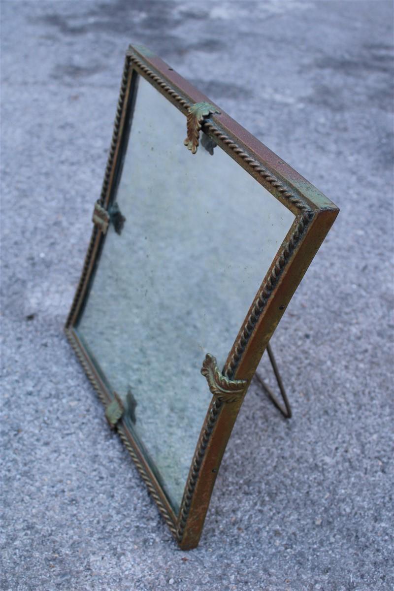 Midcentury table mirror brass gold Italian design 1950s leaves.
The mirror is original with its stains, if you wish we can change it, included in the price.