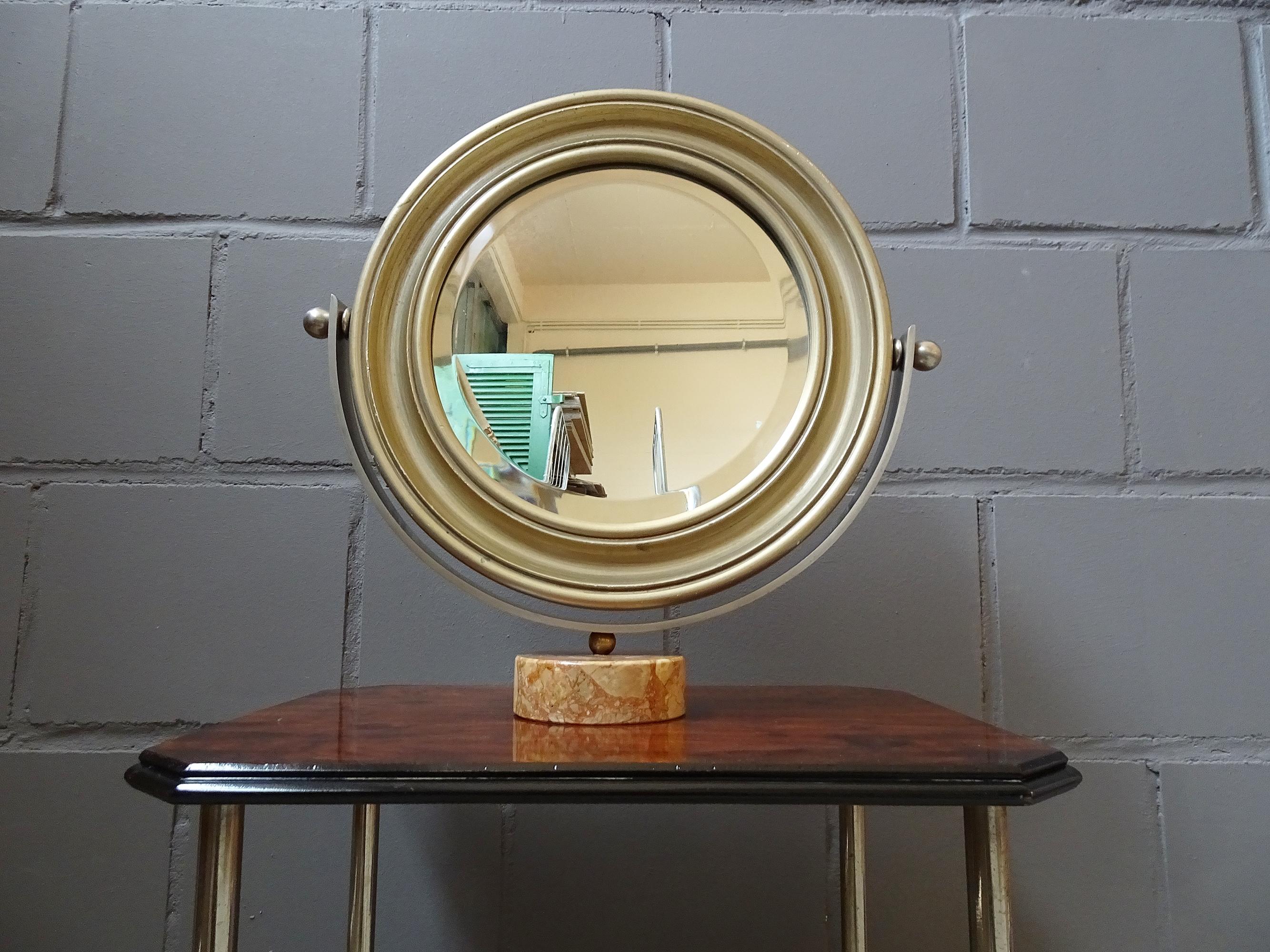 rare with marble foot!

mid century table mirror by Sergio Mazza for Artemide. Shapely modern Italian design, The metal holder with three characteristic spheres on a round marble base.

Timeless Italian design from the 1960s.

Slight signs of