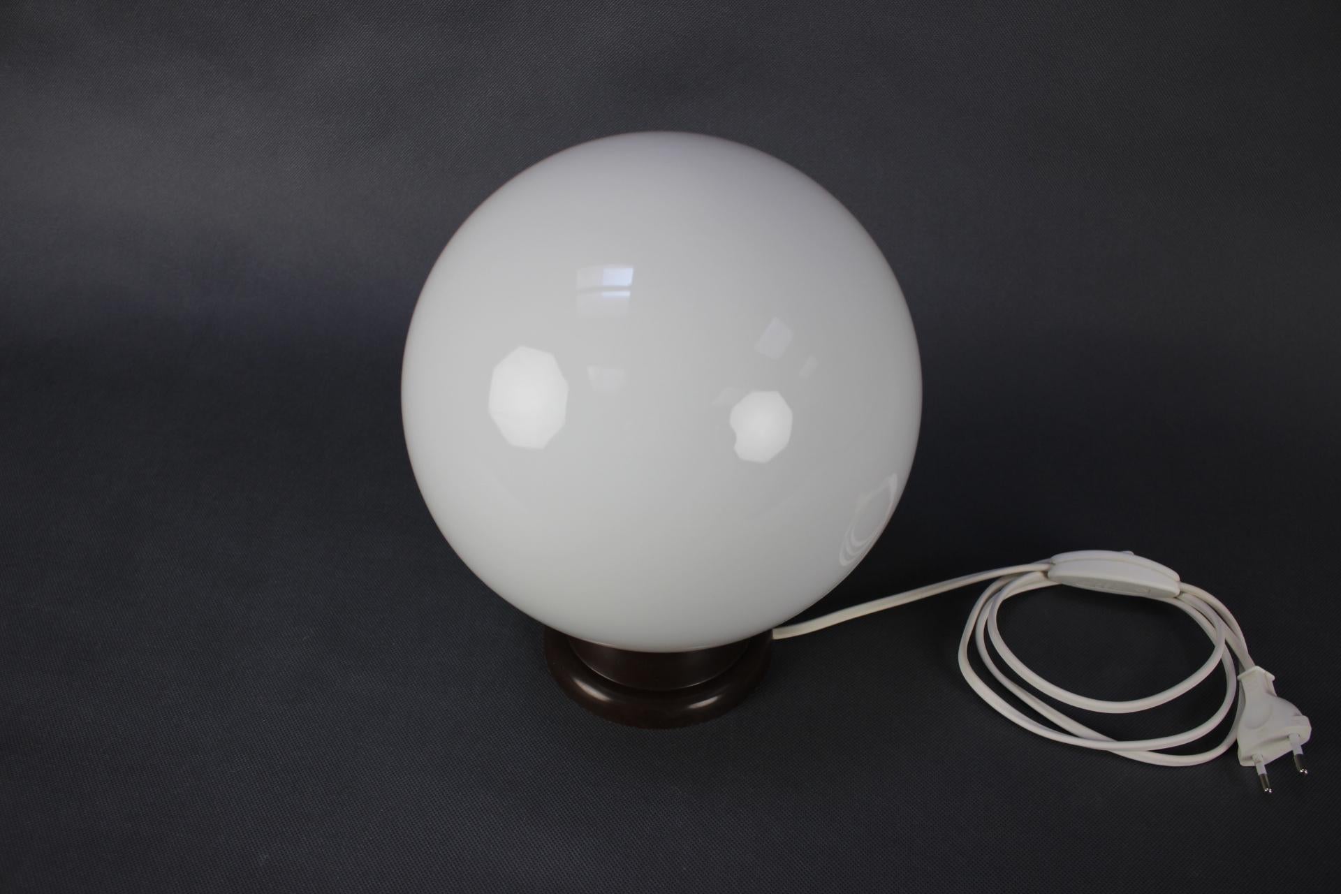 - Mid-Century Table or Wall Lamp, Czechoslovakia, 1970s,
- made of Plastic and Glass
- shows signs of wear and age (scratches, etc.),
- in good original condition,