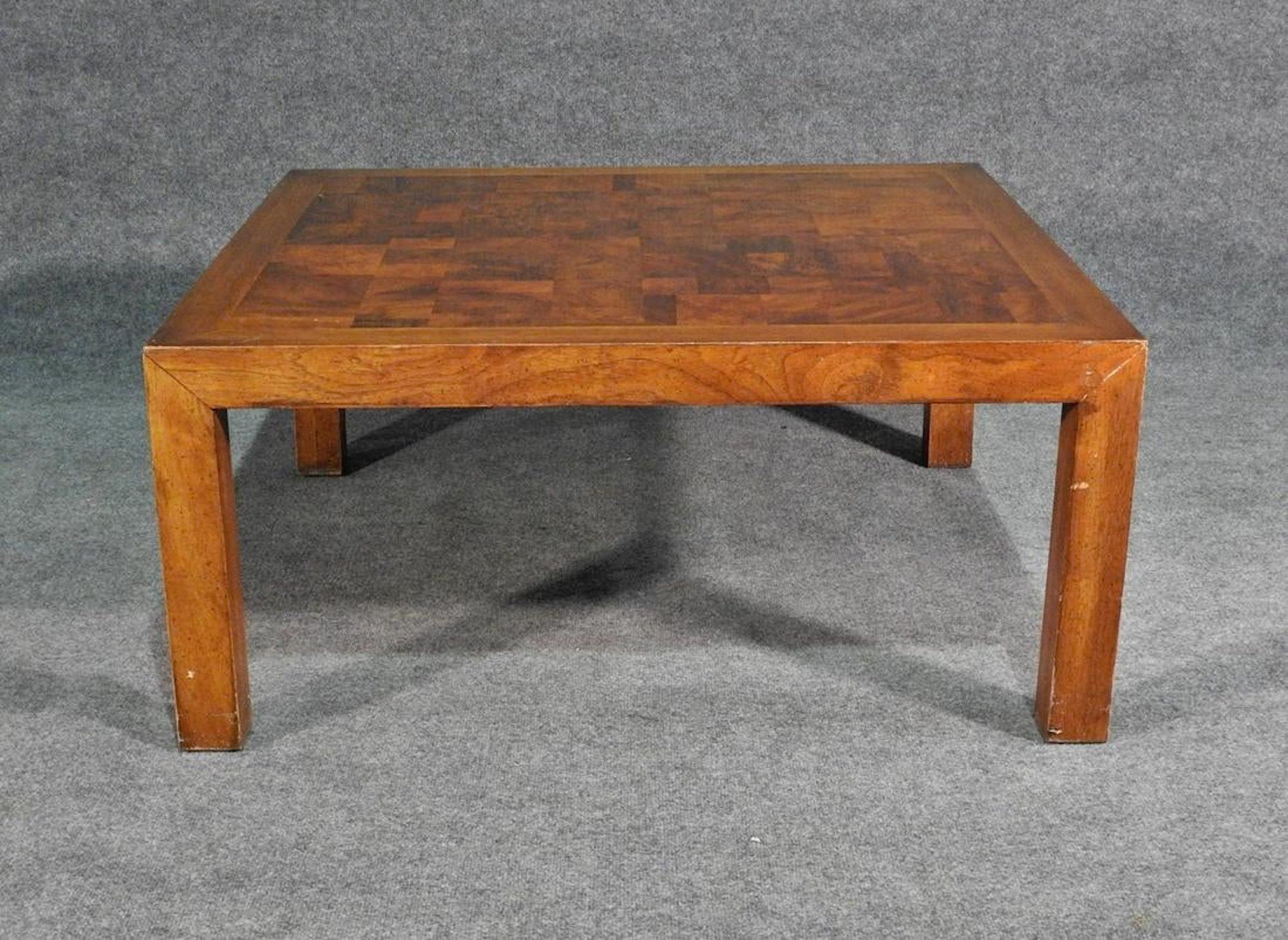 Vintage modern coffee table by Drexel with patchwork burl inlay top and walnut frame.
(Please confirm item location - NY or NJ - with dealer).
 