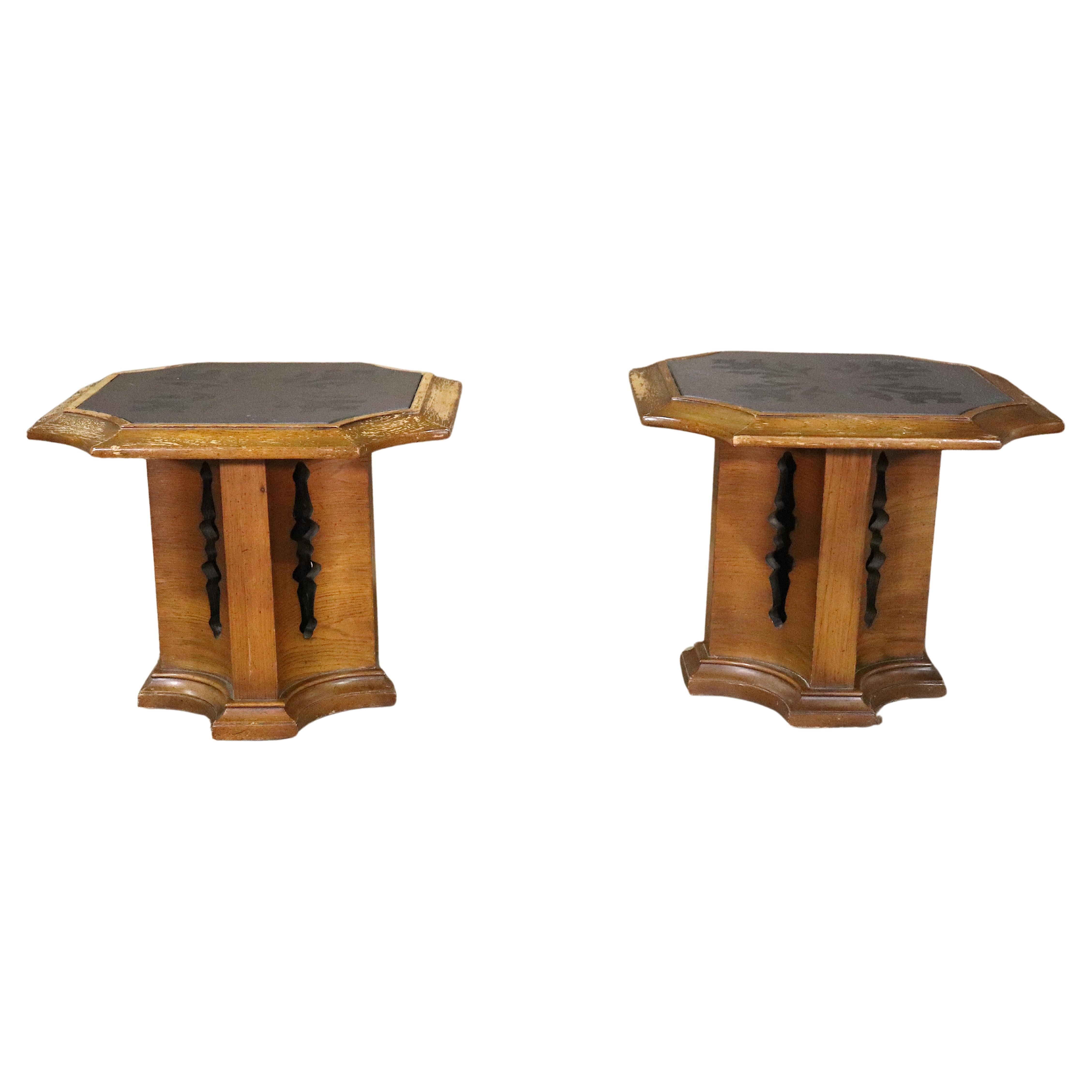 Pair of vintage side tables in walnut wood with black slate tops. Tops are etched and bases are sculpted out.
Please confirm location NY or NJ