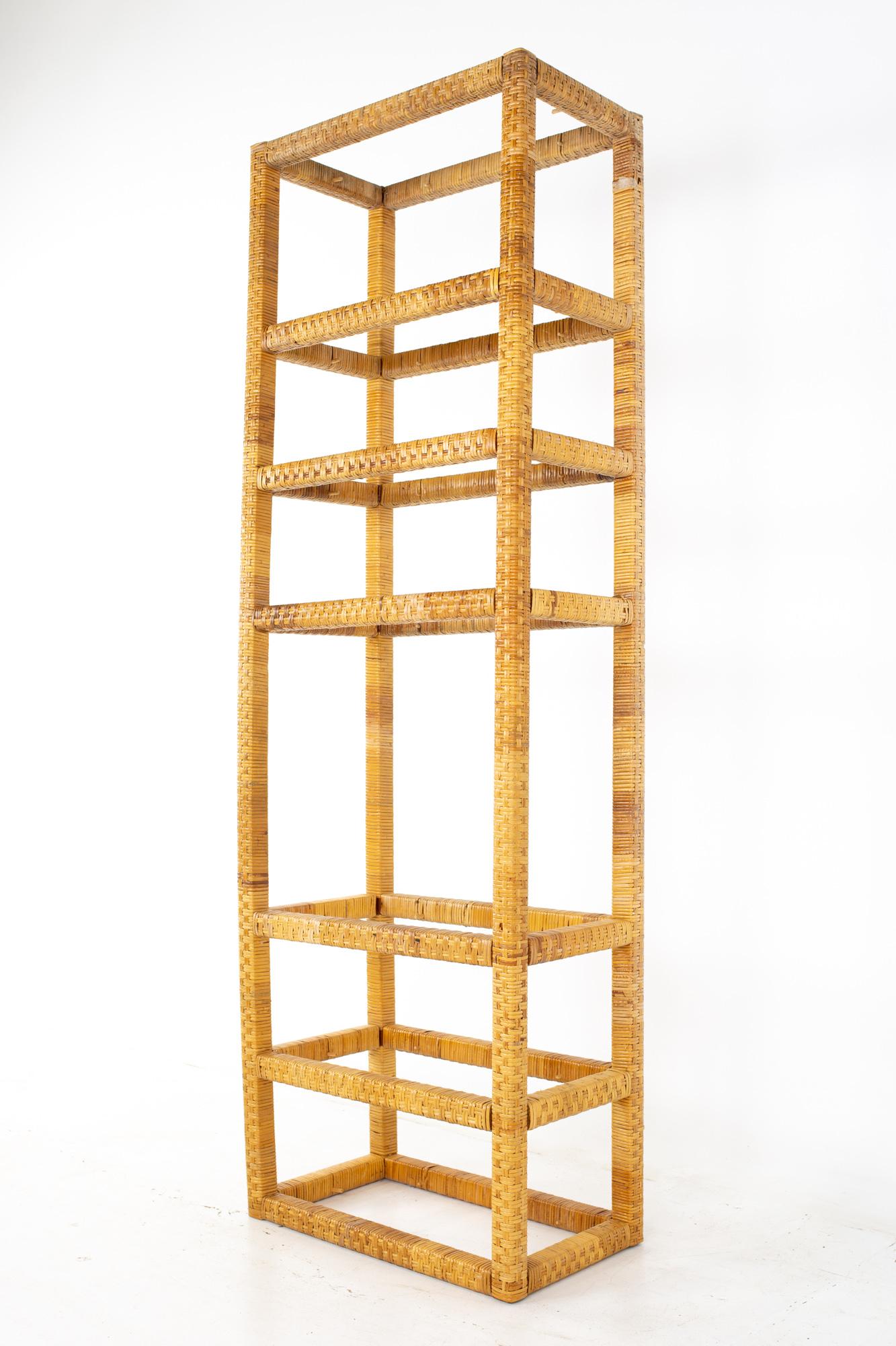 Mid century tall cane and glass étagère shelf
Shelf measures: 27 wide x 16 deep x 84 inches high

All pieces of furniture can be had in what we call restored vintage condition. That means the piece is restored upon purchase so it’s free of