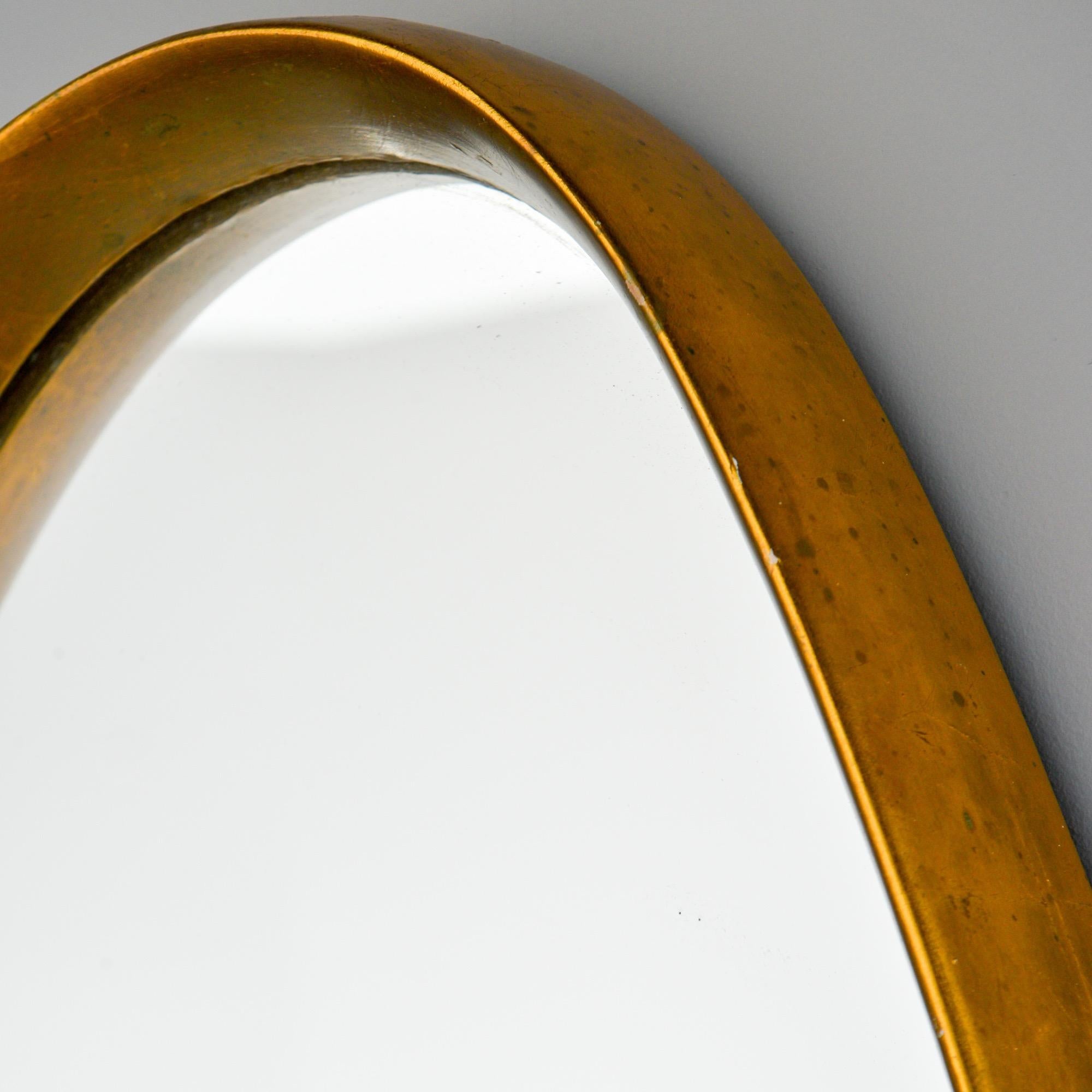slim oval mirror