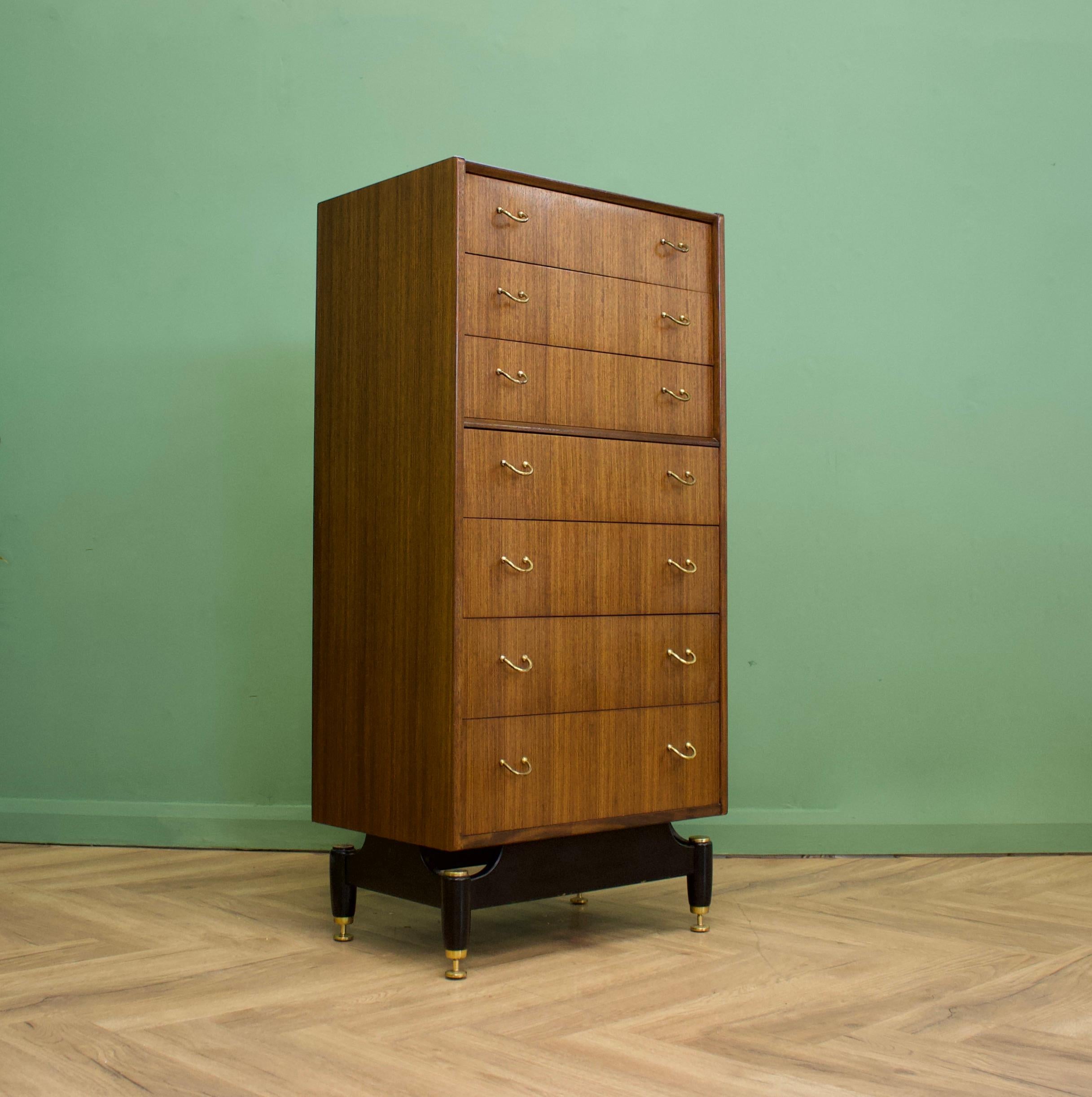 - Midcentury Tola wood tallboy chest of drawers
- Manufactured by G-Plan for the Librenza range
- Features 7 drawers.