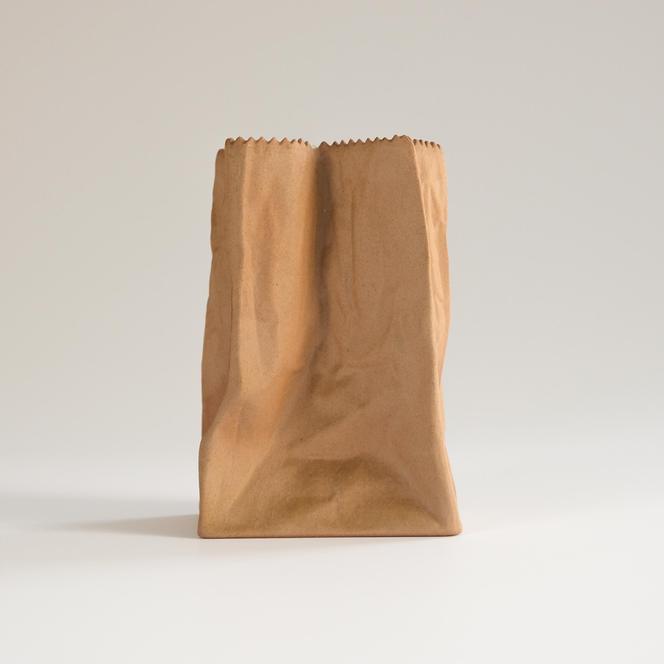 For sale is an iconic Mid-Century porcelain “Paper Bag