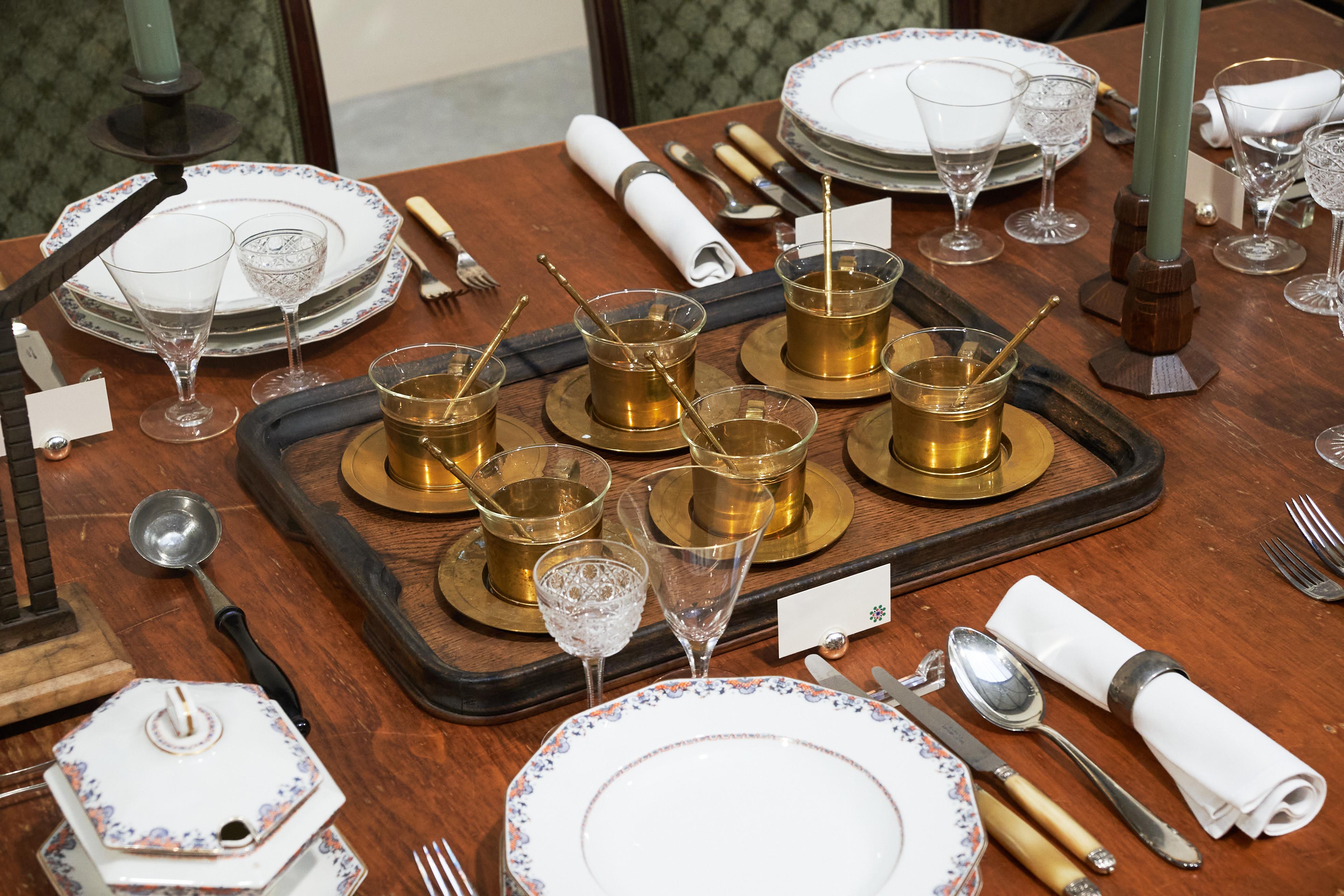 Mid Century Tea Set in Patinated Brass, Schott Verran.

This is a very stylish and elegant mid century tea set in patinated brass and glass. Six saucers, six cups and six beautiful ‘faux bamboo’ style spoons. 

Great patina on the brass parts -
