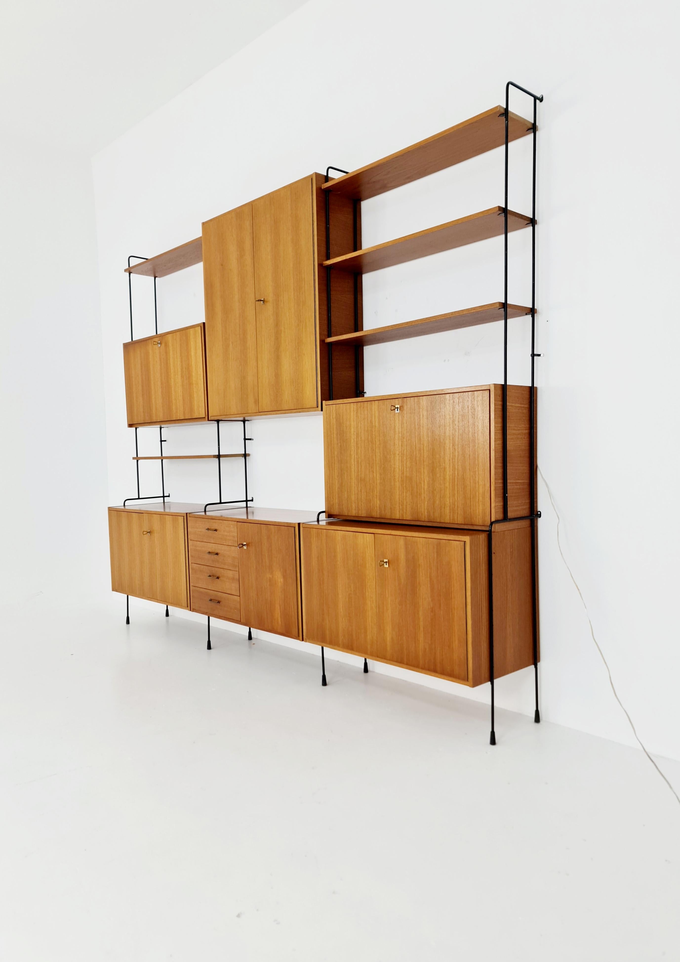 Mid century Teak 11  pieces shelving unit by Hilker for Omnia, Germany  For Sale 8