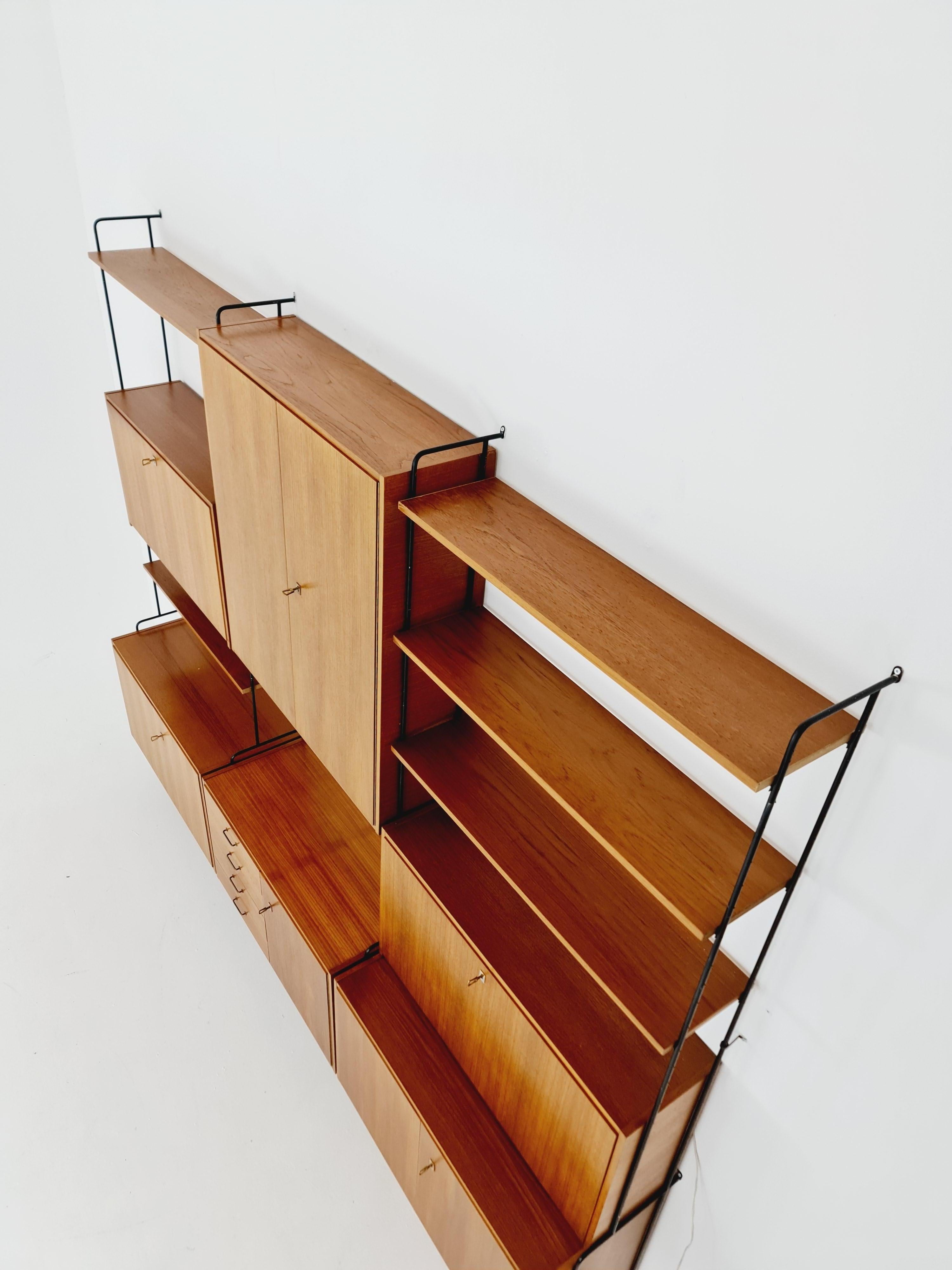 Mid century Teak 11  pieces shelving unit by Hilker for Omnia, Germany  For Sale 11