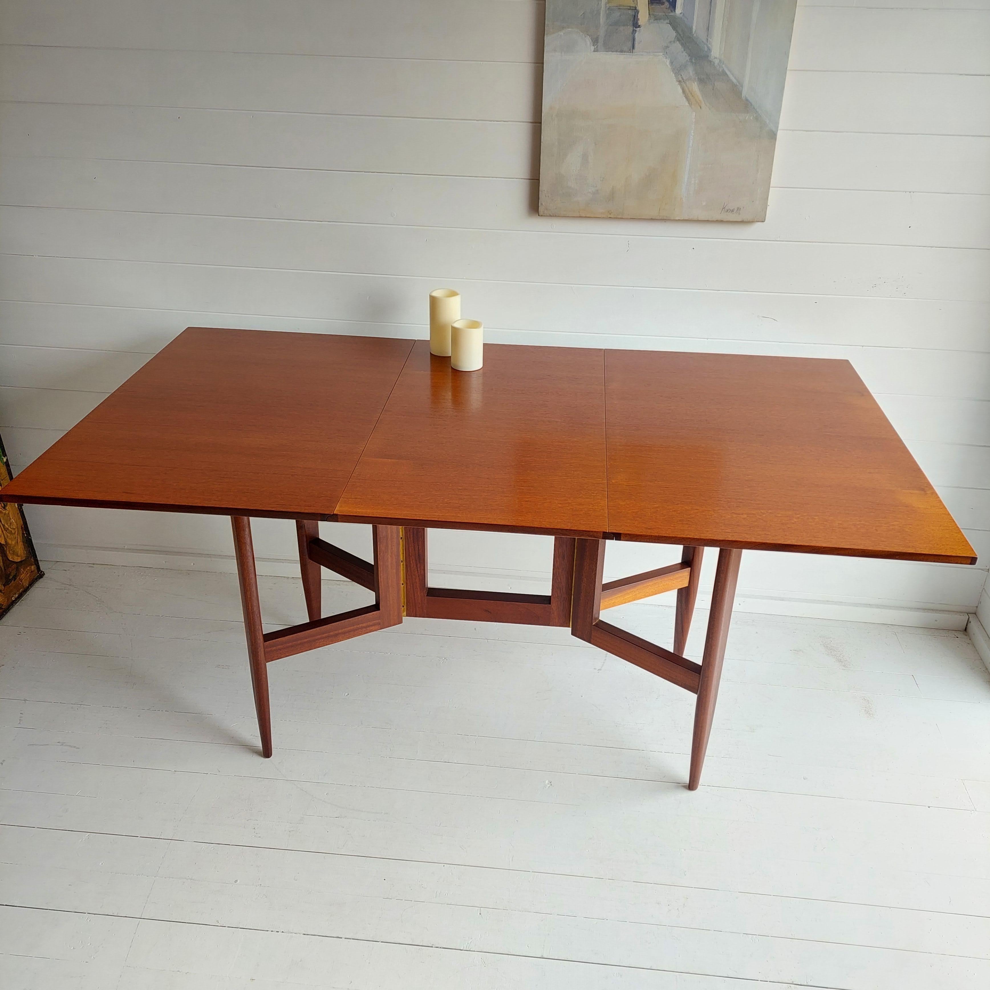 Mid-Century Modern Mid Century teak and afromosia gateleg Danish dining table, George Nelson style 