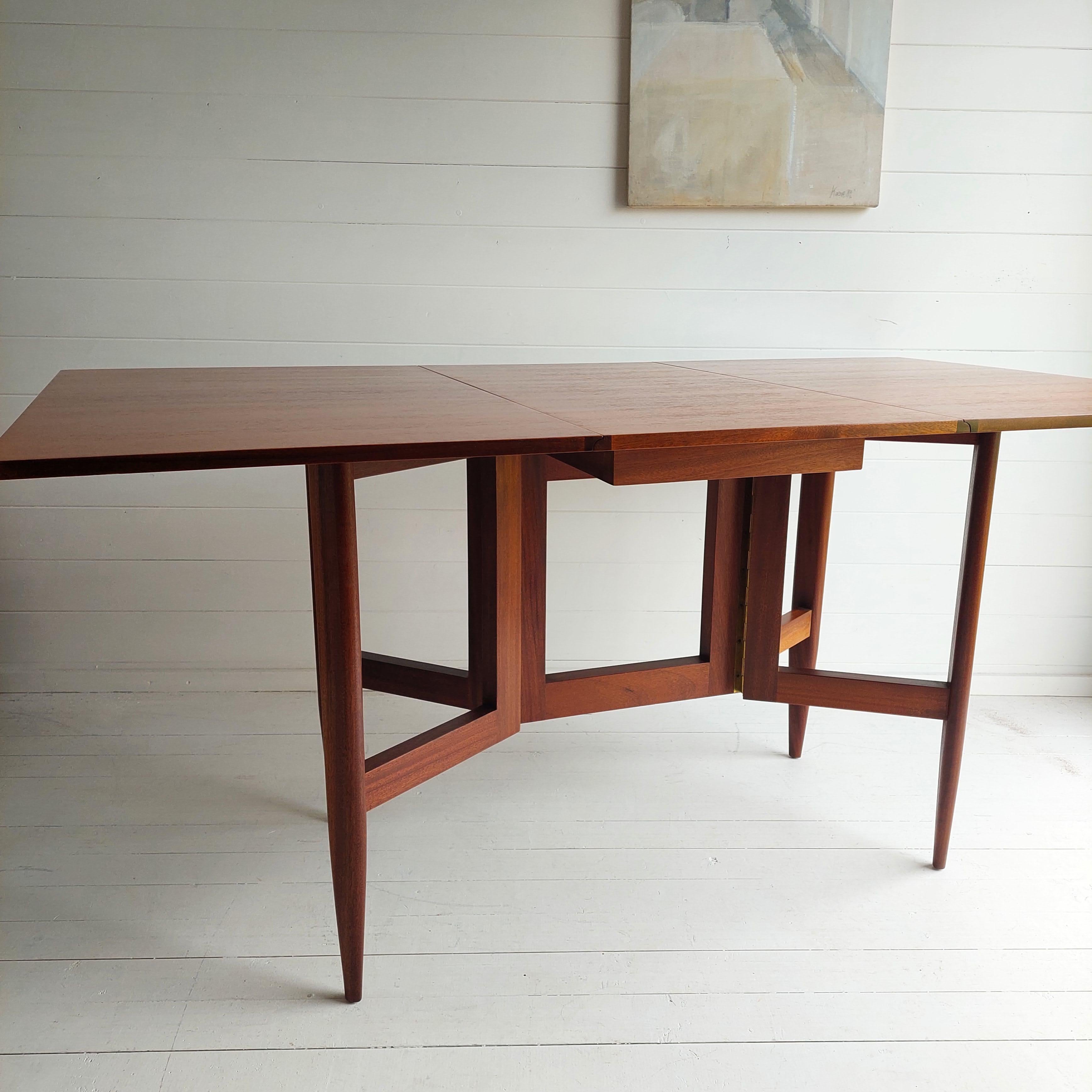 Teak Mid Century teak and afromosia gateleg Danish dining table, George Nelson style 