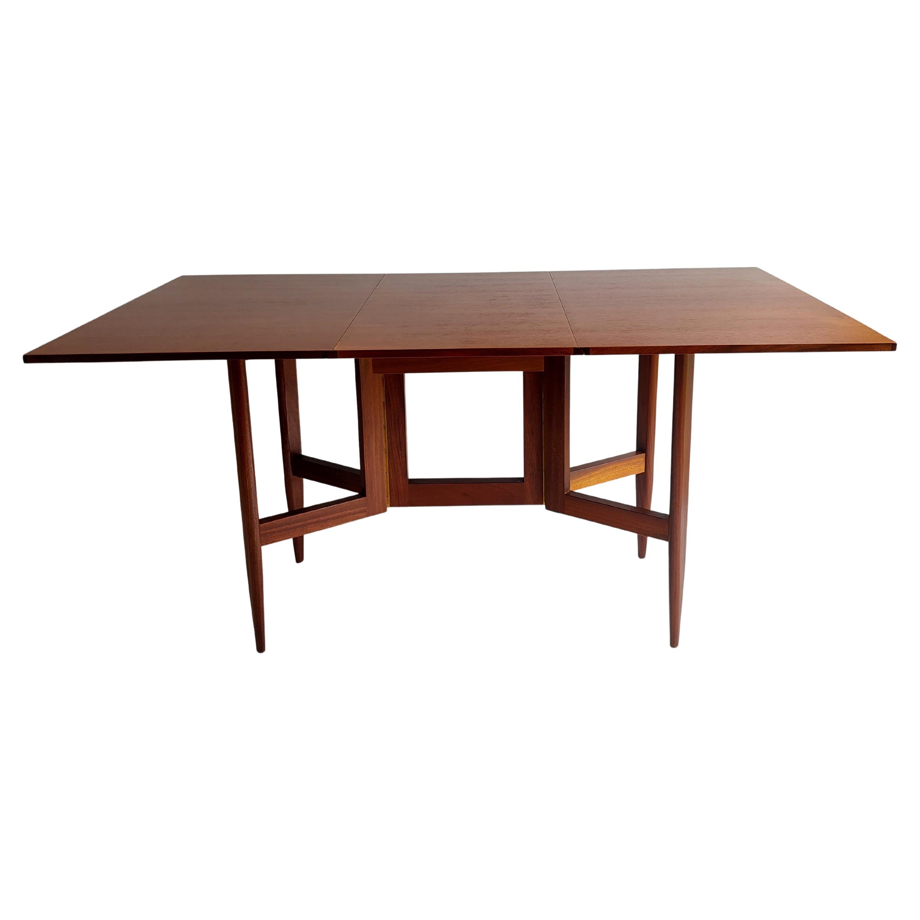 Mid Century teak and afromosia gateleg Danish dining table, George Nelson style 