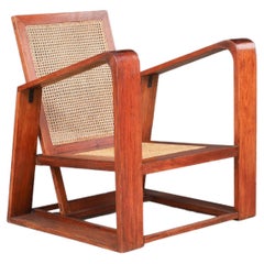 Chaise longue en teck et rotin du milieu du siècle, France, années 1950.