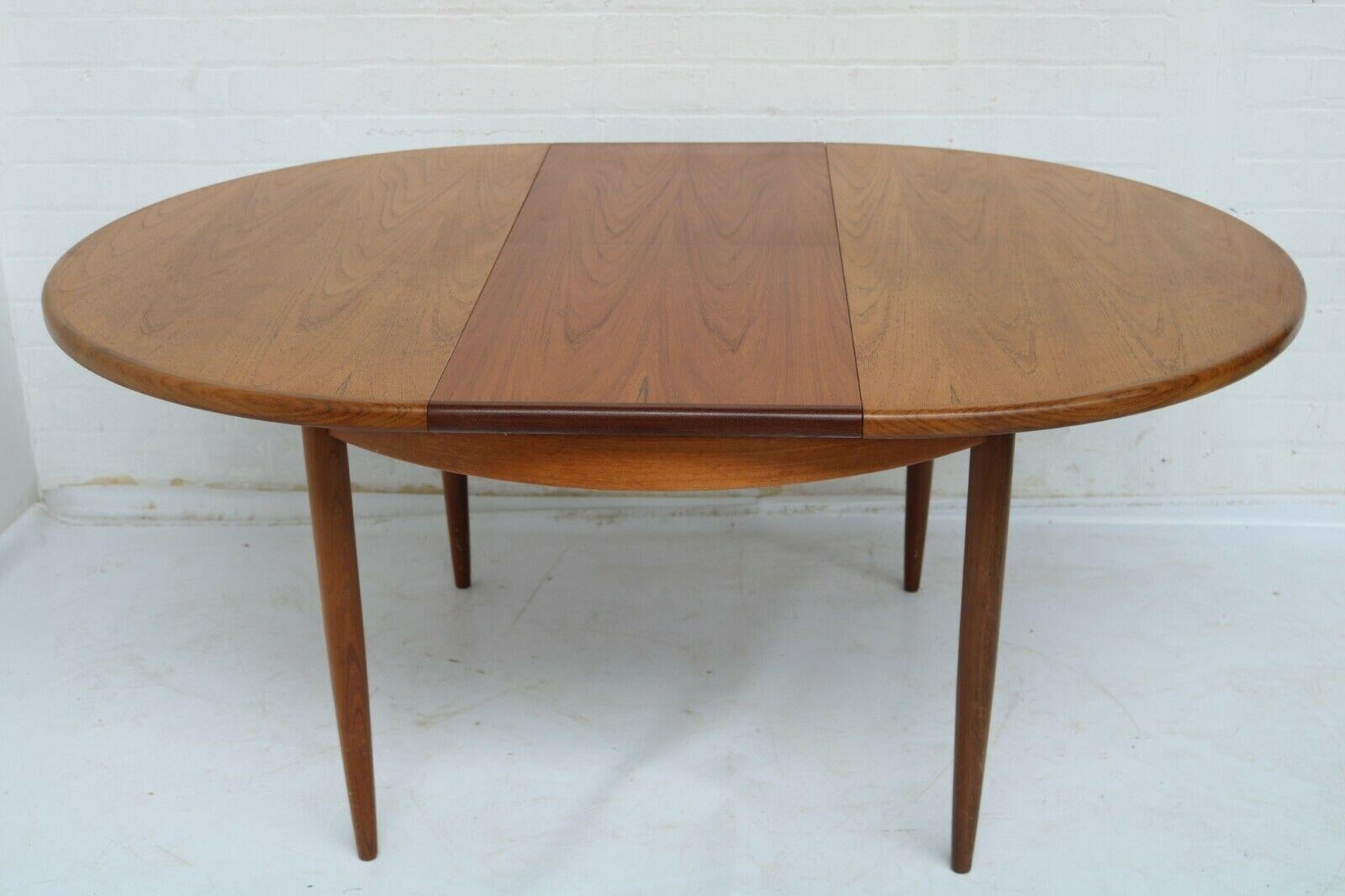 Mid-Century Modern Mid-Century Teak and Rosewood Ib Kofod-Larsen Extensible Dining Table and Chairs