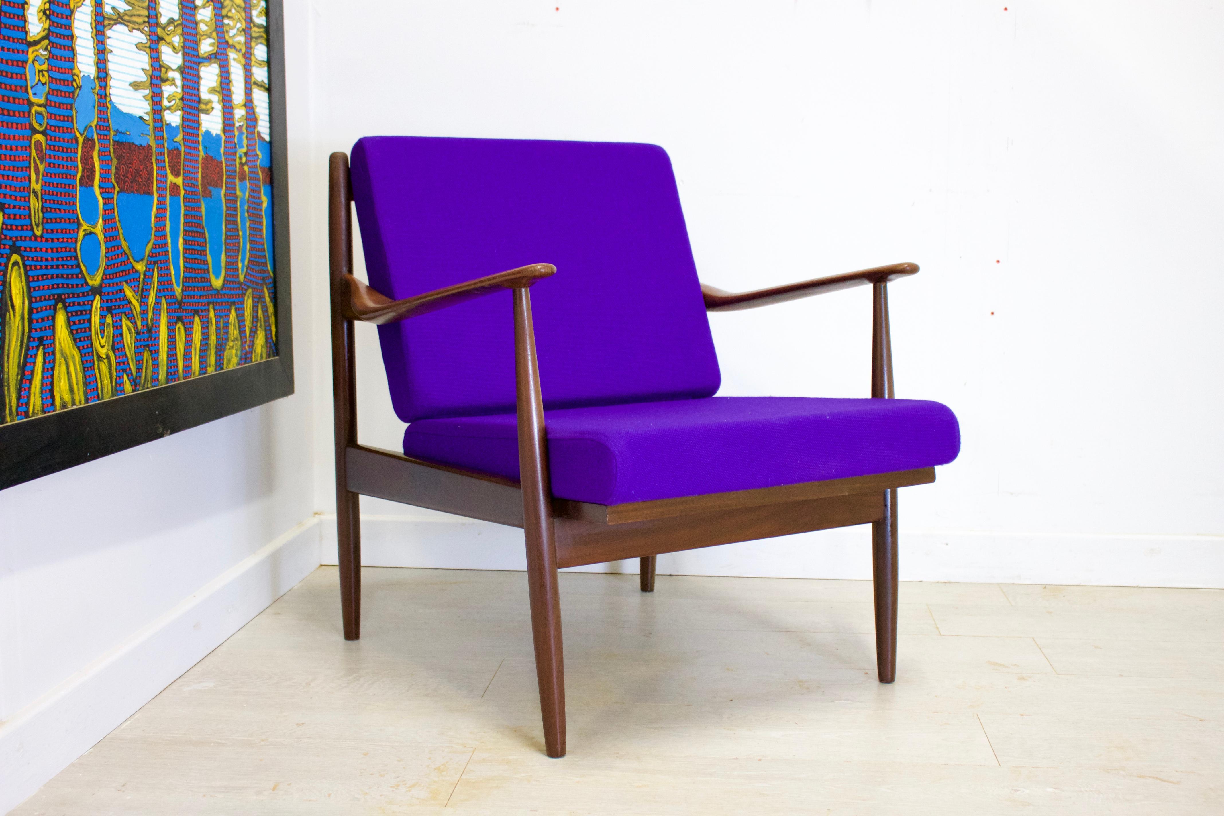 Midcentury design

- Mid-Century Modern armchair
- Made in Denmark or Sweden
- Featuring purple upholstery 
- Recently reupholstered with new webbing
- Made of teak.