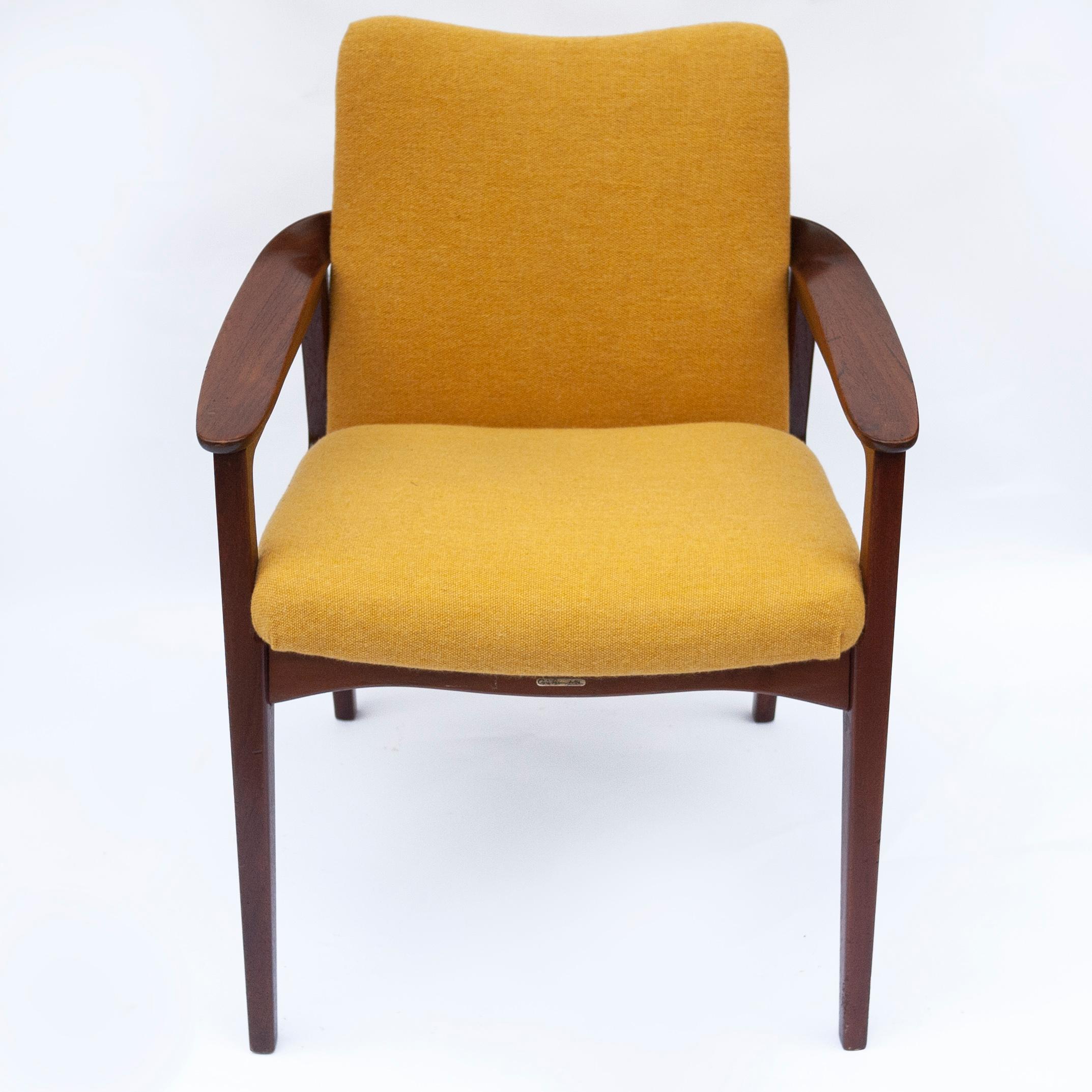 An armchair designed by Sigvard Bernadotte and manufactured by France and son. Sigvard Bernadotte was the uncle of Margrethe the 2nd, Queen of Denmark.
With newly upholstered yellow coloured fabric. Designed and handwoven in London by Robyn