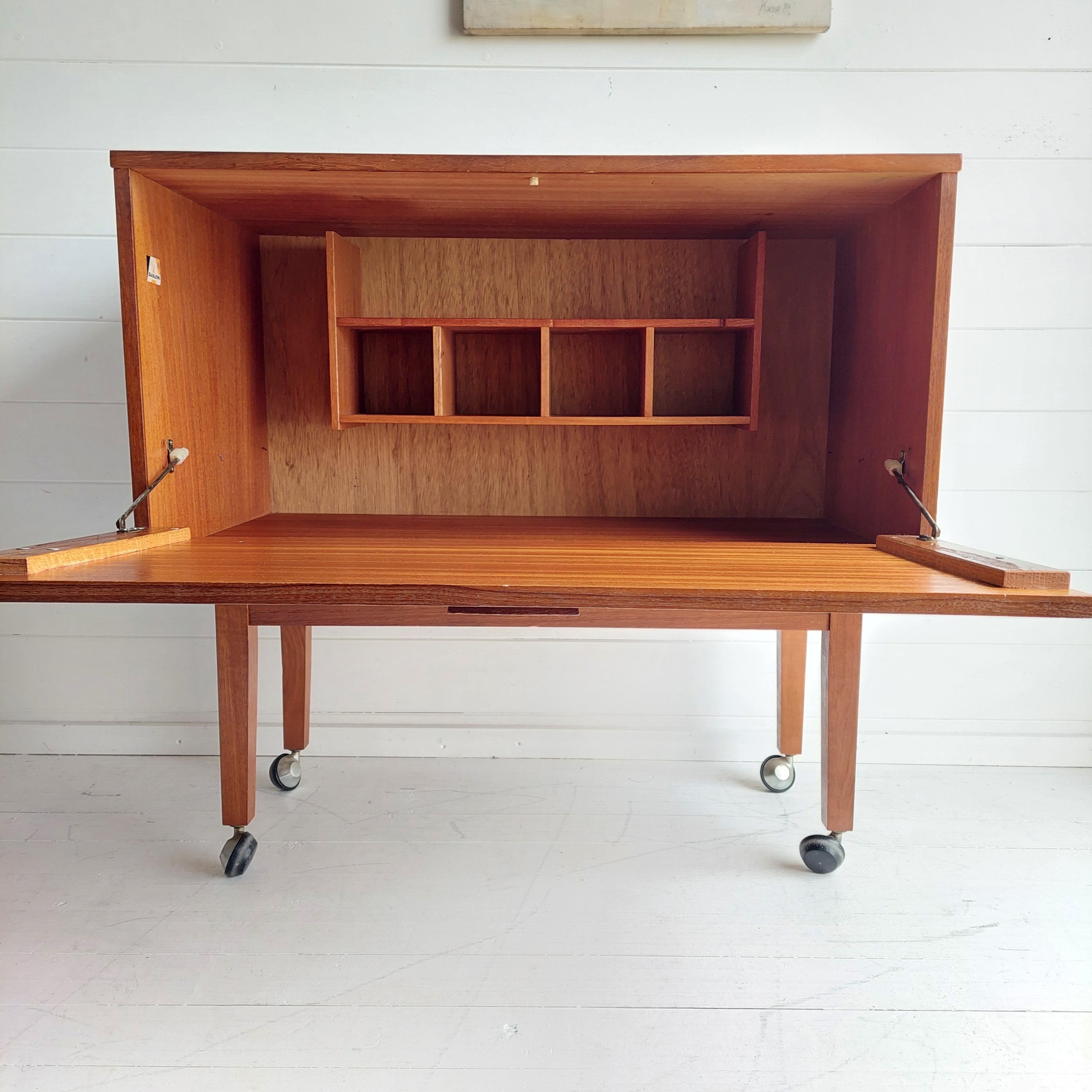 Mid Century Teak Bar Cabinet on wheels By Avalon, Poul Cadovius style, 1965. 2