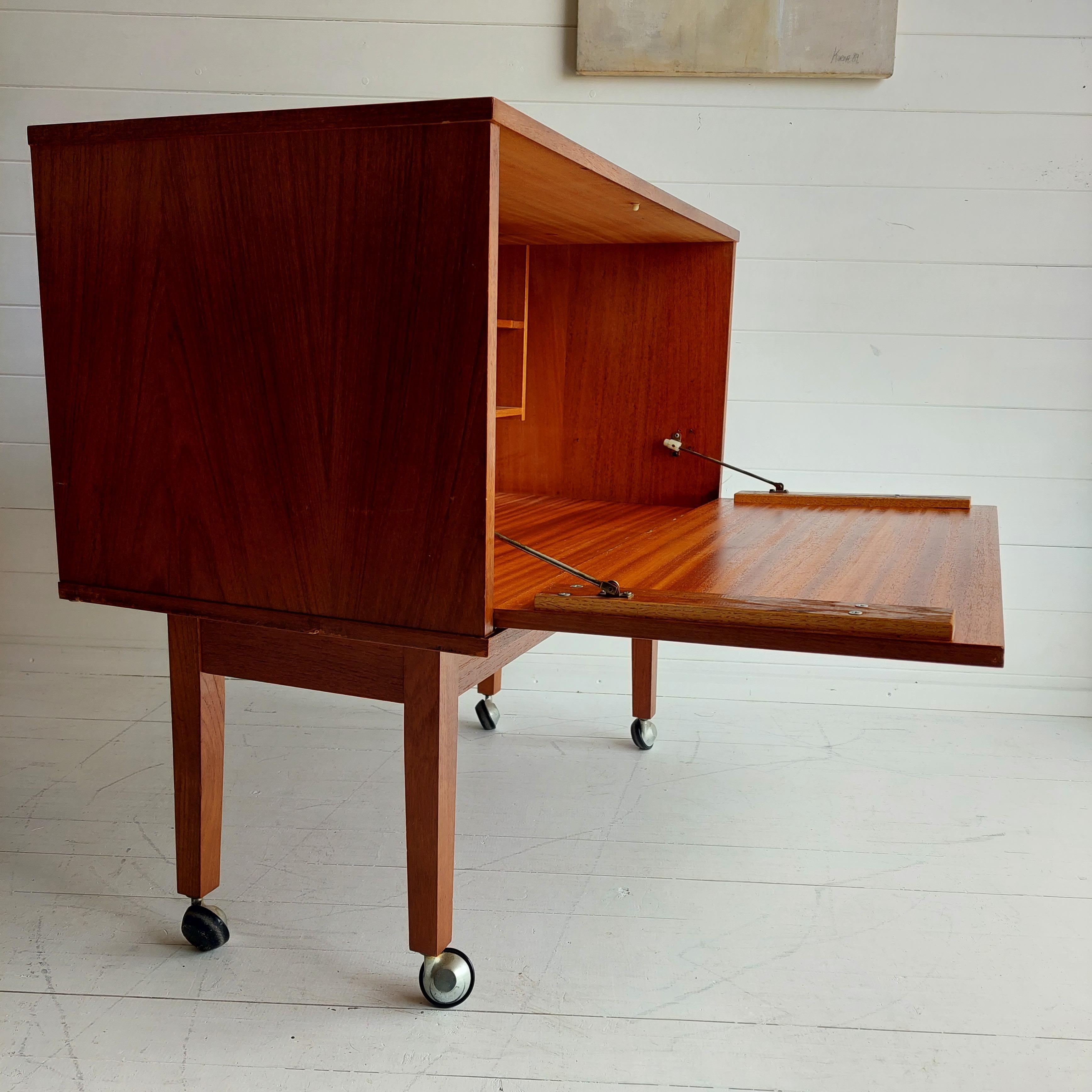 Mid Century Teak Bar Cabinet on wheels By Avalon, Poul Cadovius style, 1965. 3