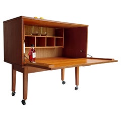 Mid Century Teak Bar Cabinet on wheels By Avalon, Poul Cadovius style, 1965.
