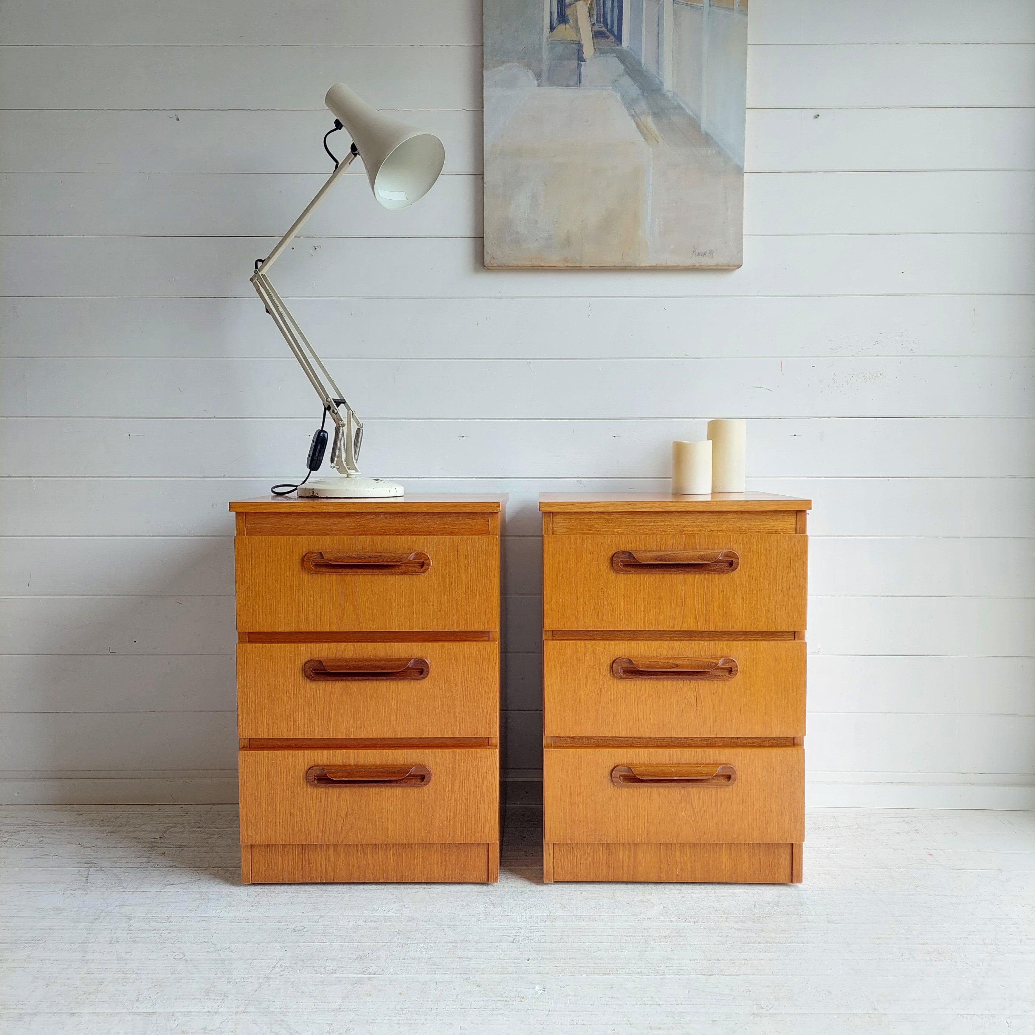 A really smart JS Sakol retro teak veneer three drawer matching pair of drawers / bedside cabinets, circa 1970s.

Teak drawers by J. S. Sakol  with similarities to the G Plan Fresco range.
This delightful  pair of chest of drawers was designed and