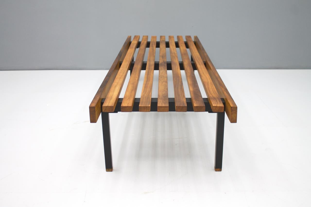 Nice teak wood slat bench from the 1960s. Metal legs with wood. Very good condition.
Measures: W 160.5 cm, D 48 cm, H 29.5 cm.