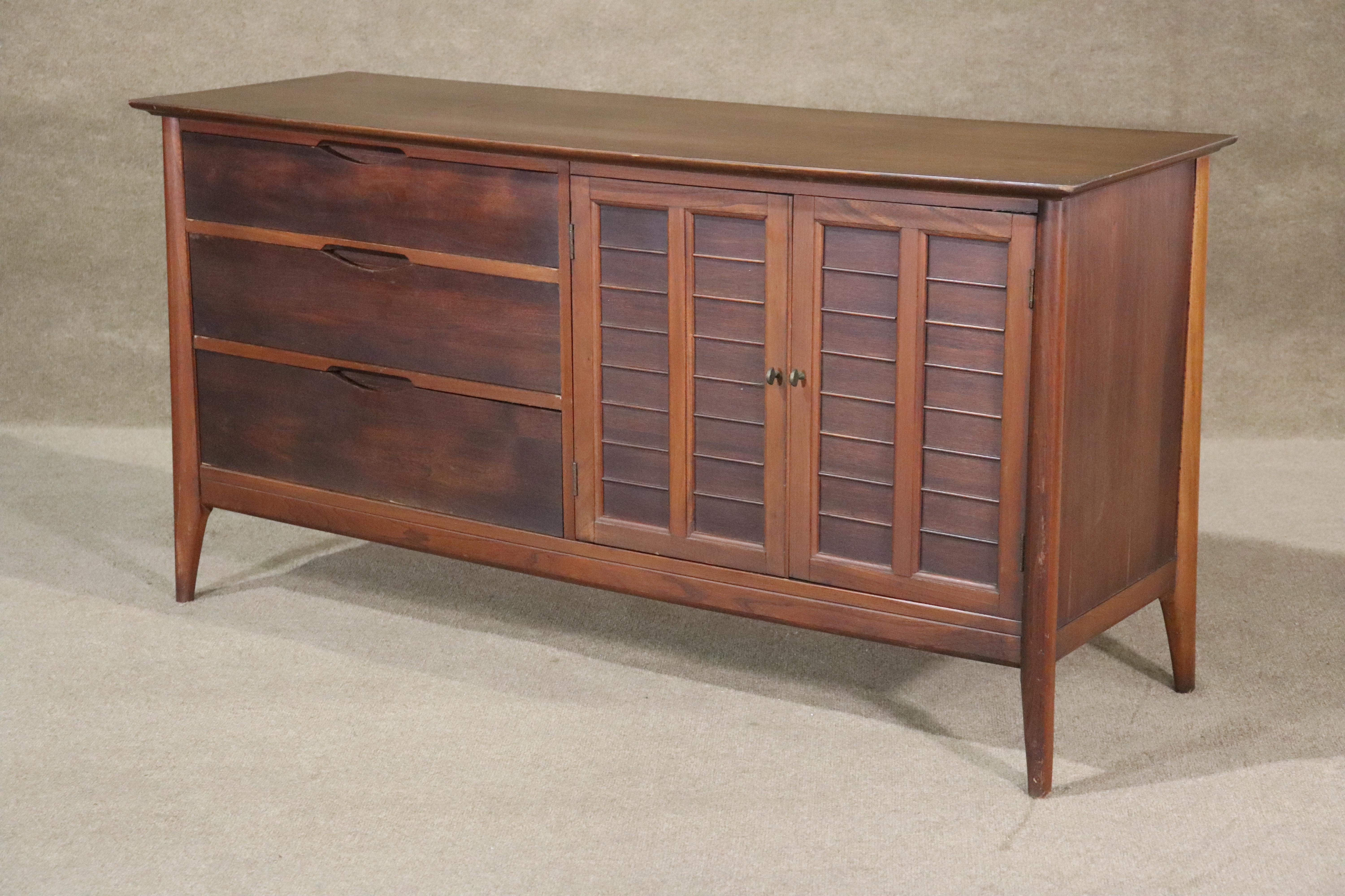 Vintage Danish made buffet or small credenza with drawers and cabinet storage.
Please confirm location NY or NJ