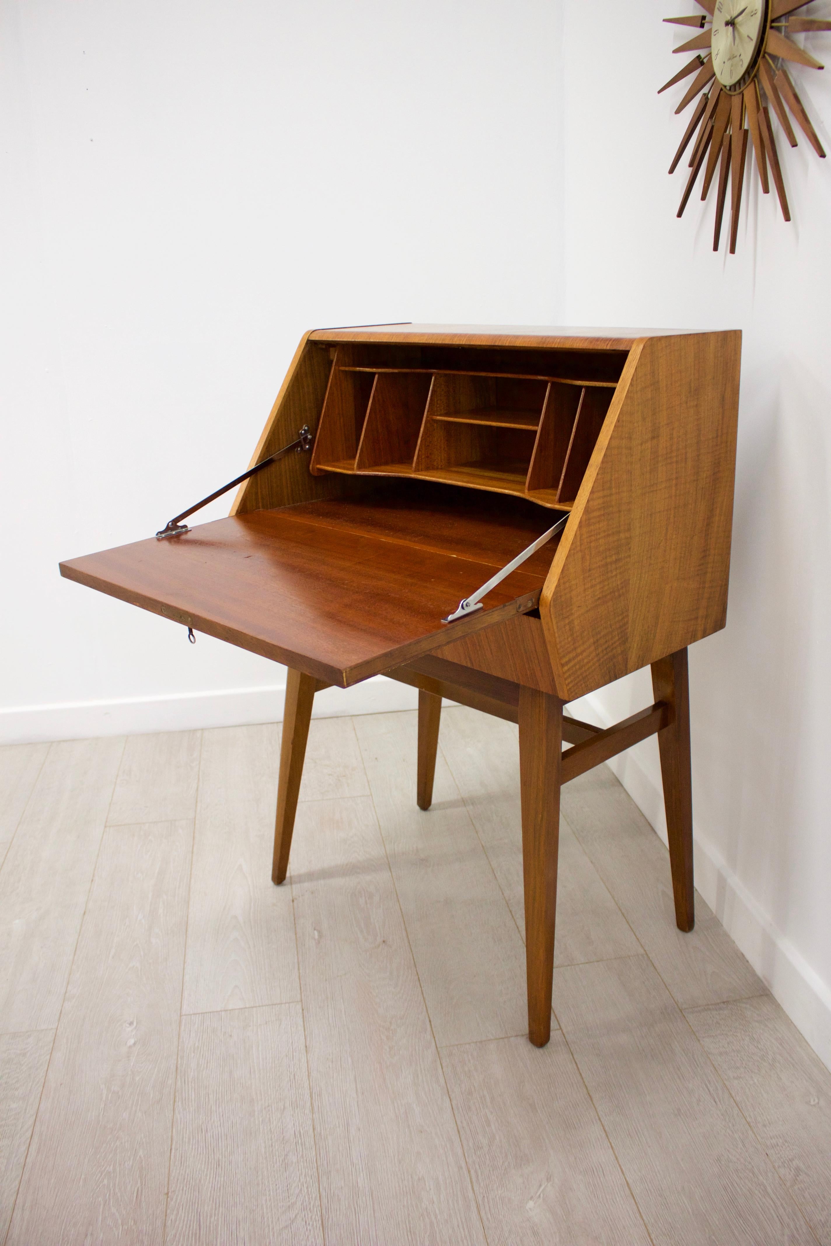 - Midcentury bureau
- Manufactured in the UK
- Made from teak and teak veneer